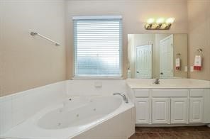 21502 Venture Park Drive, Richmond, TX 77406 Primary bath with double sinks, jetted tub, and separate shower