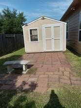 21502 Venture Park Drive, Richmond, TX 77406 Sturdy storage shed in backyard