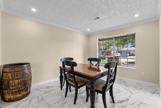 11007 Green Arbor Drive, Houston, TX 77089 Formal dining area features updated flooring, recessed lighting and large windows , allowing an abundance of natural light..