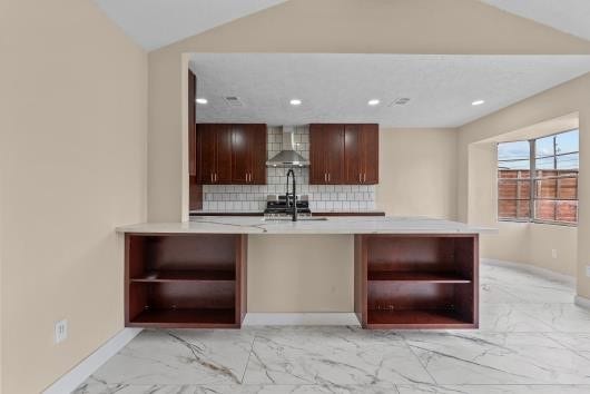 11007 Green Arbor Drive, Houston, TX 77089 This photo showcases and open concept design, living and kitchen combination. custom built in shelves enhances living area