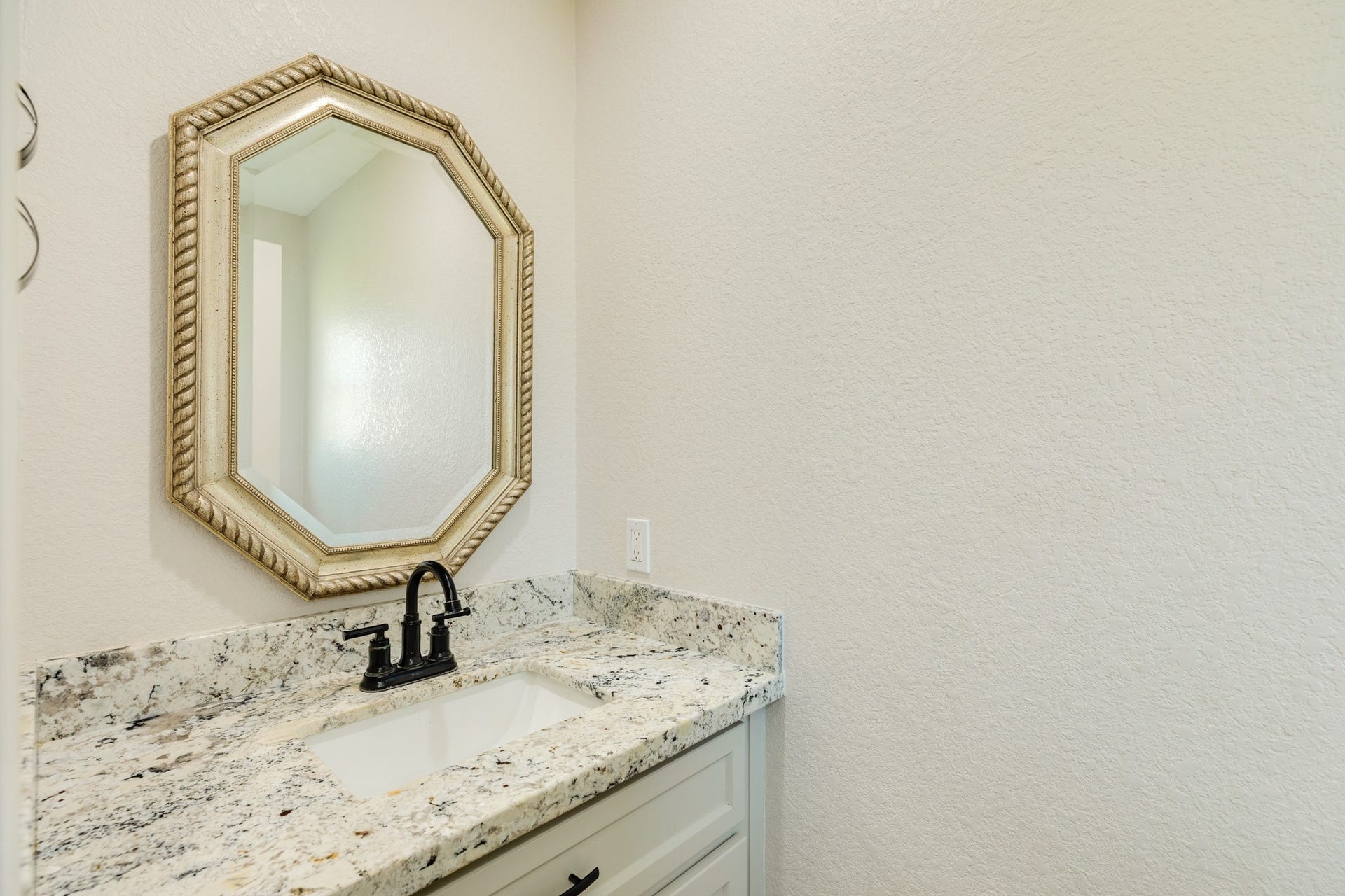 250 Wedgewood Street, Lake Jackson, TX 77566 Half bath conveniently located in the mudroom, offering easy access for pool guests.