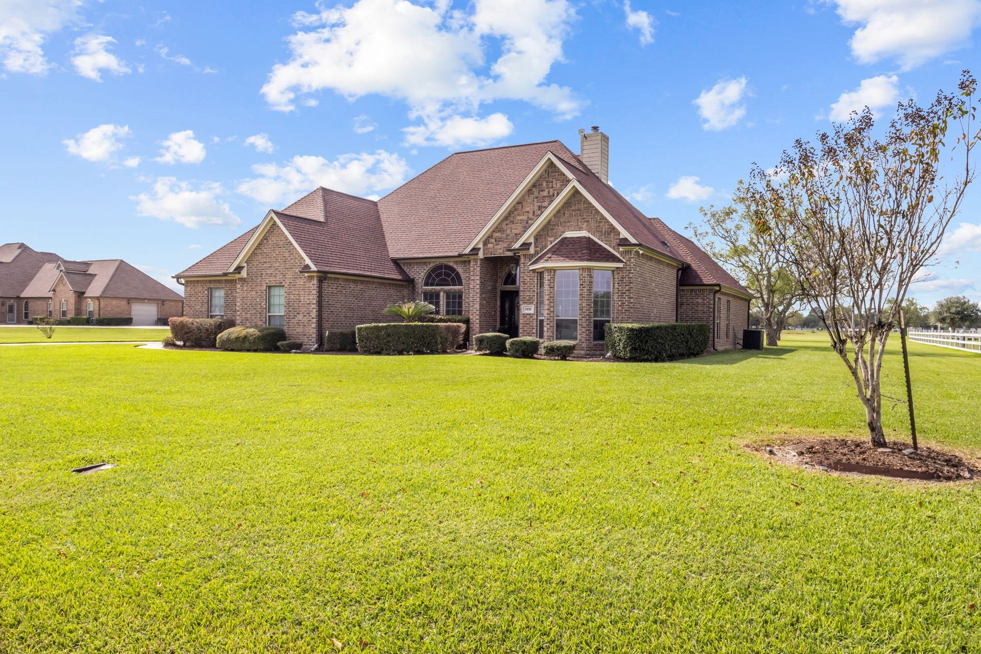11010 Madison Court, Beaumont, TX 77705 Timeless curb appeal meets wide open spaces! This beautiful brick home features a striking roofline with a new roof installed in 2024, manicured landscaping, and a welcoming entrance. Set on over 2 acres, this property offers the perfect blend of charm, space, and country-style living.