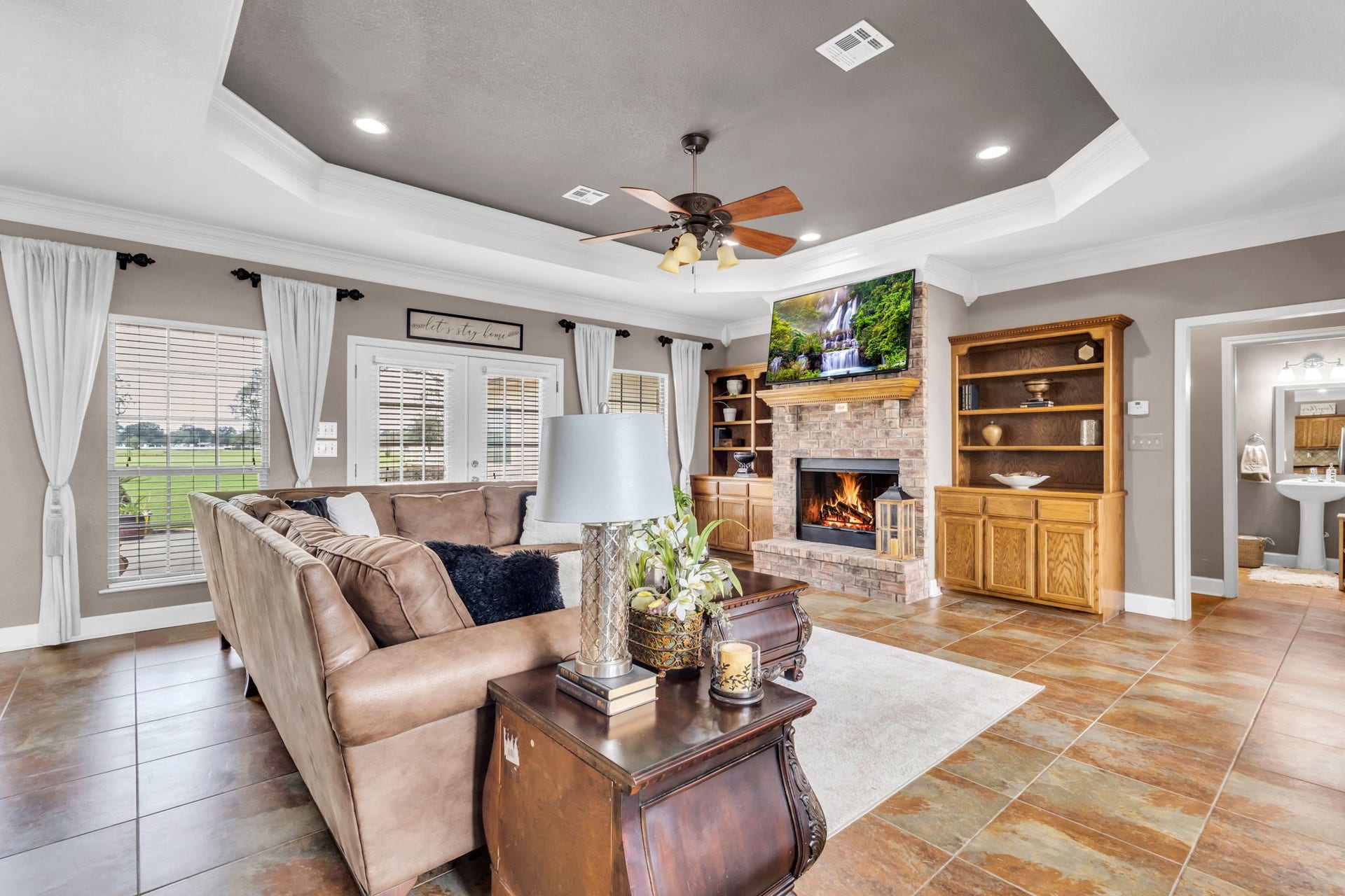 11010 Madison Court, Beaumont, TX 77705 Expansive living area designed for both everyday comfort and entertaining, offering generous seating space, an open layout, and easy access to the outdoor living area. A perfect blend of functionality and inviting design.