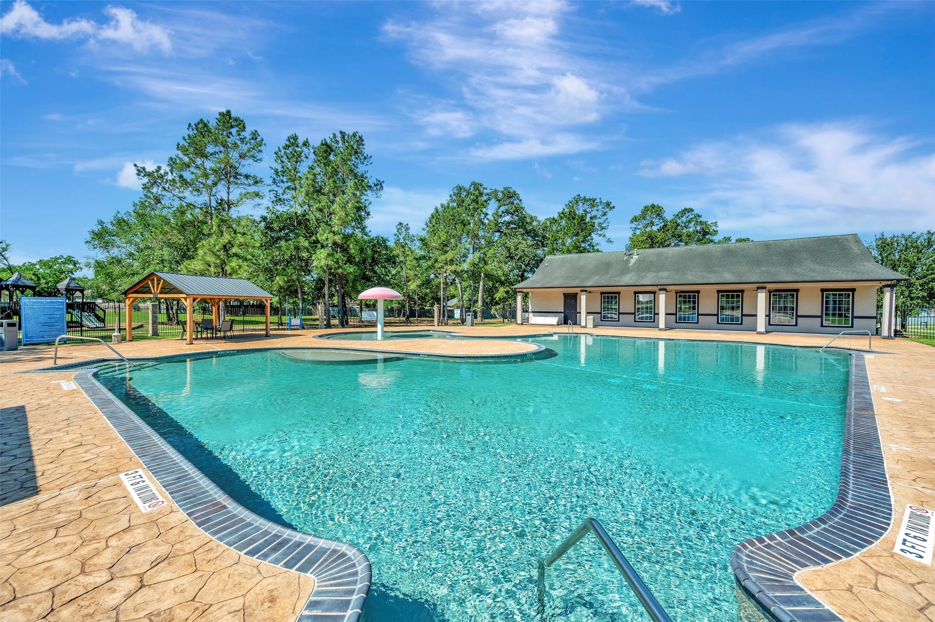 30598 Johnson Alley, Magnolia, TX 77355 Relax by the community pool located in Glen Oaks.