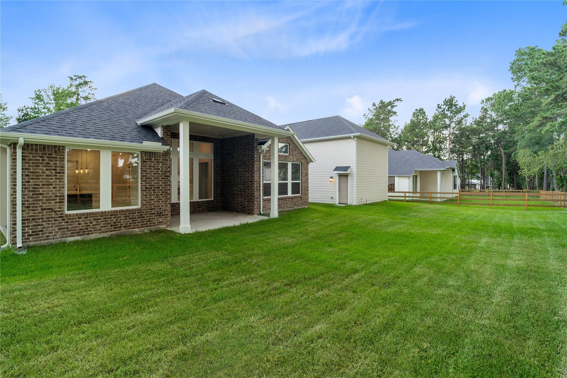 17728 Gold Saddle Lane, Magnolia, TX 77354 A sweeping view of the backyard offers a wide-open canvas with seamless access to the massive detached workshop.