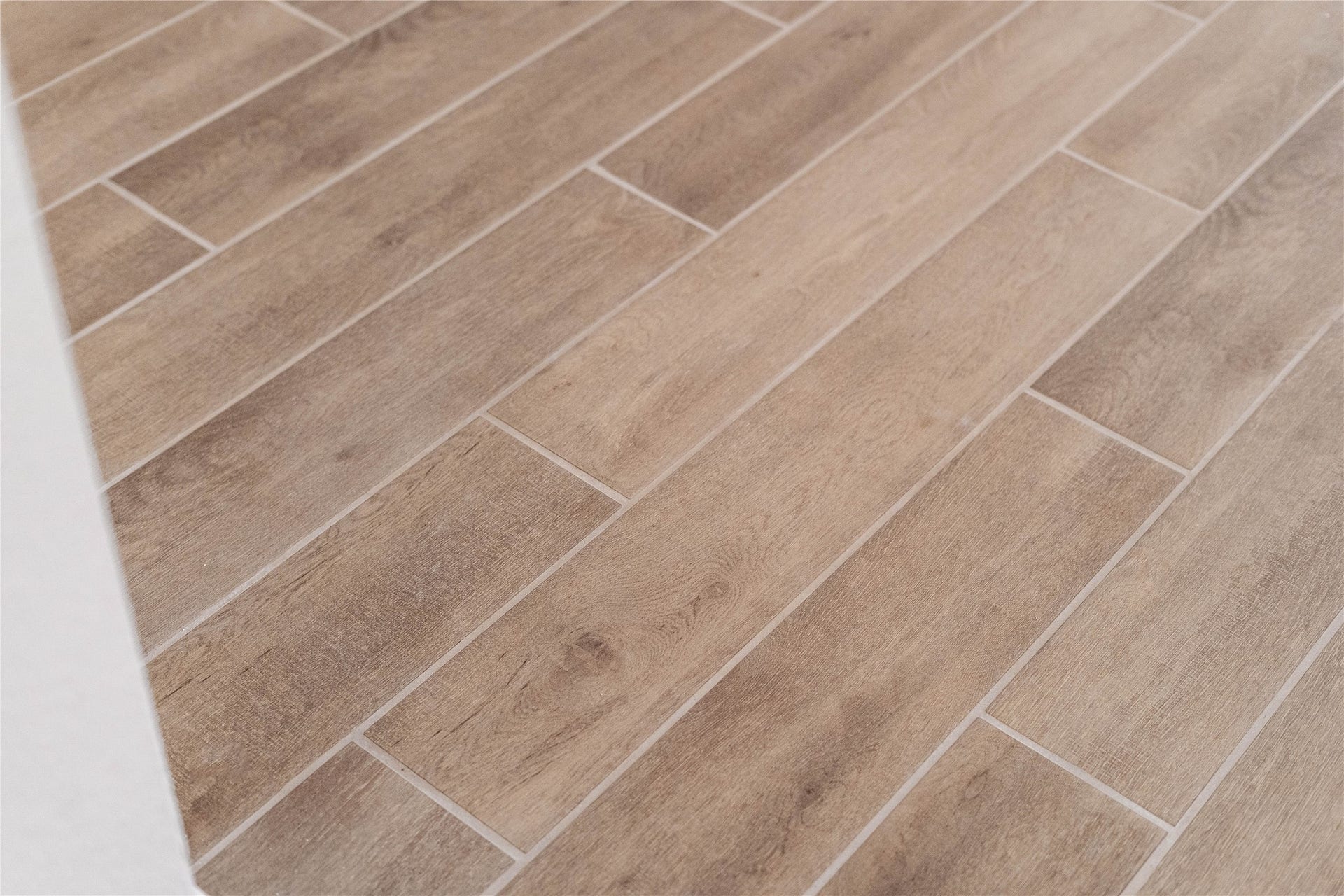 17728 Gold Saddle Lane, Magnolia, TX 77354 Premium wood-look tile flooring offers the organic warmth and beauty of natural hardwood combined with the unmatched durability of tile.