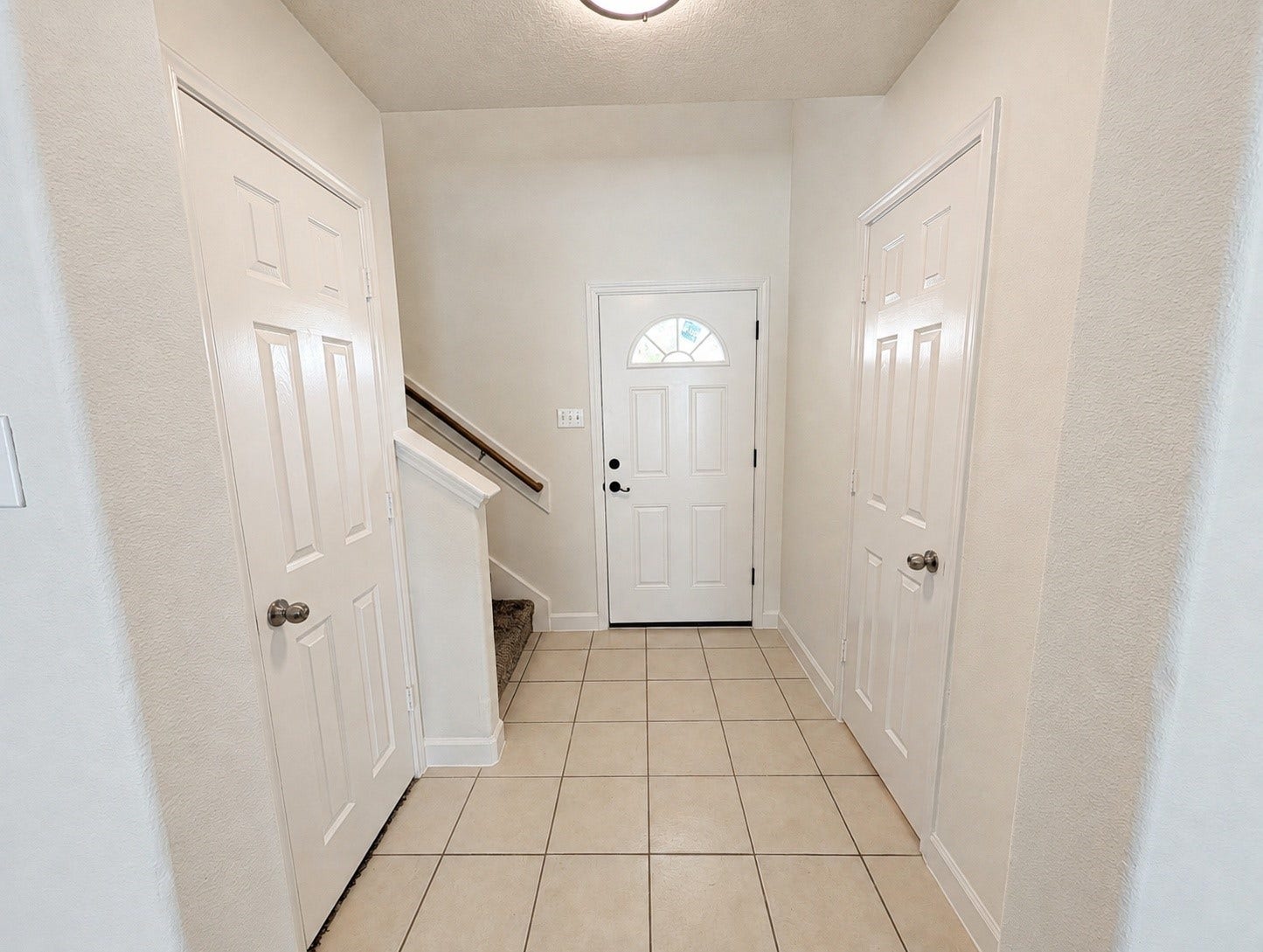 2019 Briar Grove Drive, Conroe, TX 77301 A brand new front door adds a nice touch to the welcoming foyer.