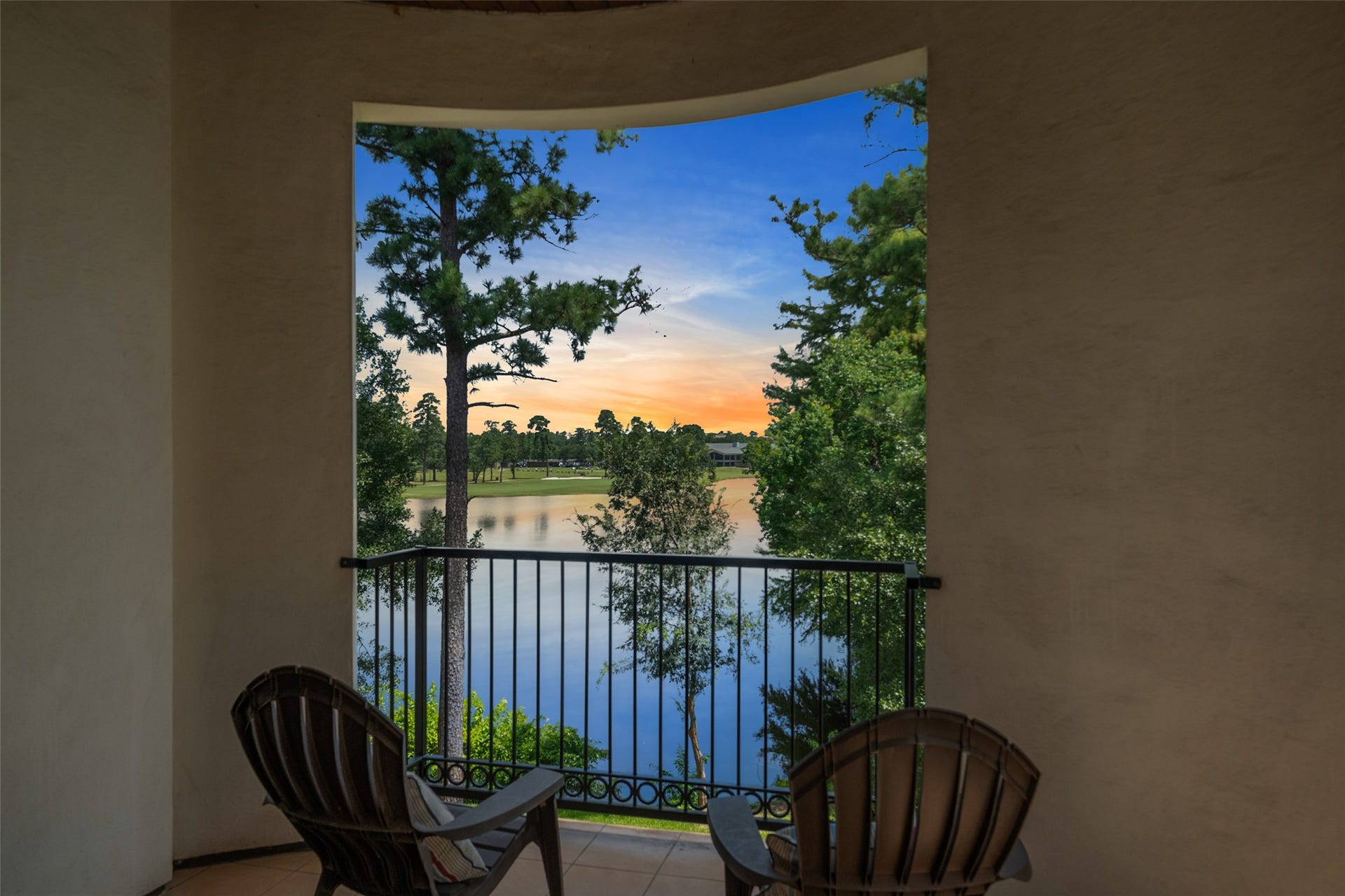 18 Secluded Trail, The Woodlands, TX 77380 GORGEOUS VIEWS IN THE MORNING OR EVENING OF LAKE HARRISON AND THE GOLF COURSE, THERE ARE 2 ROOMY BALCONIES OVERLOOKING THE VIEWS