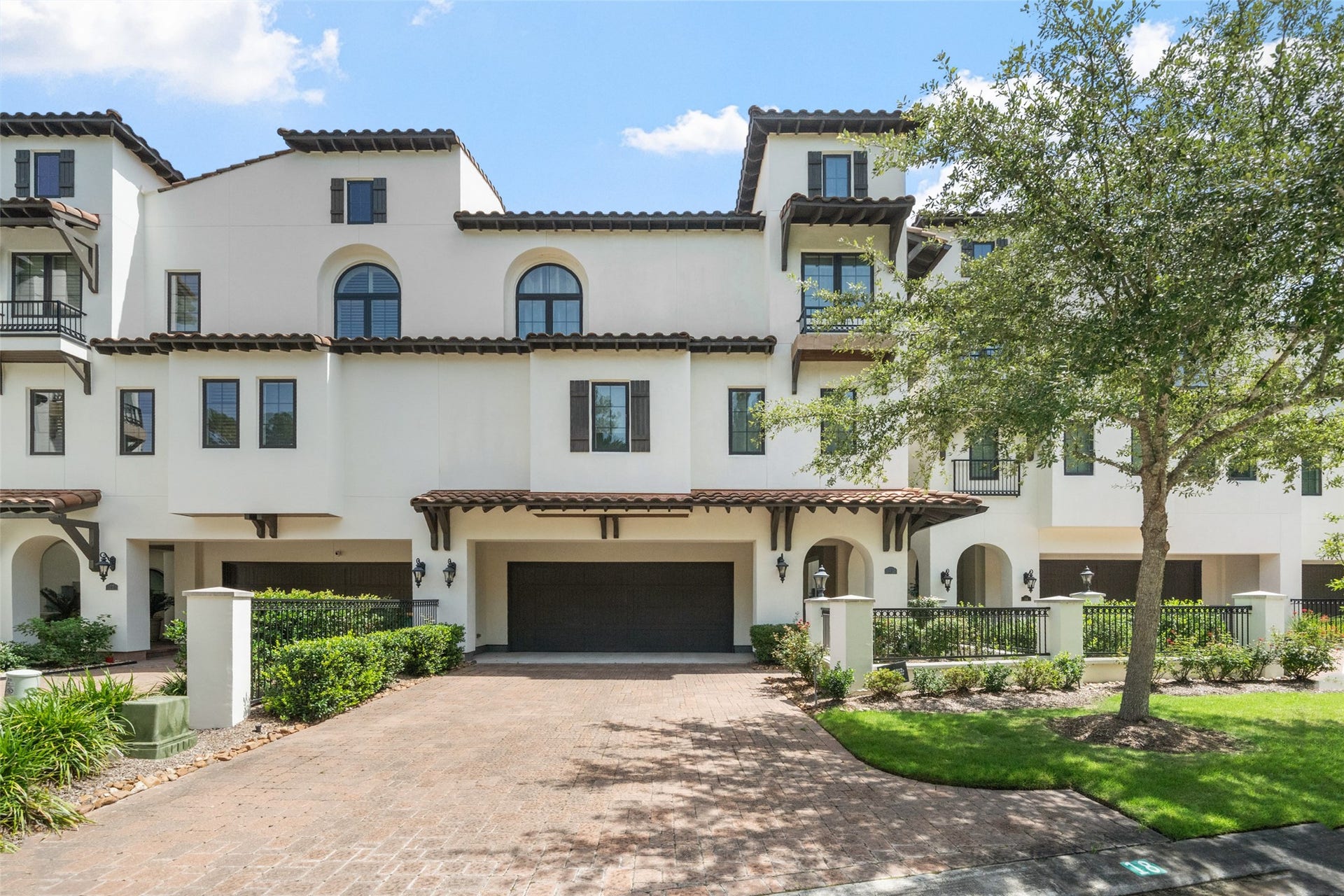 18 Secluded Trail, The Woodlands, TX 77380 AFTER ENTERING THROUGH THE CONTROLLED GATE, YOU COME UPON YOUR 2 - CAR GARAGE ACCESSING YOUR OASIS