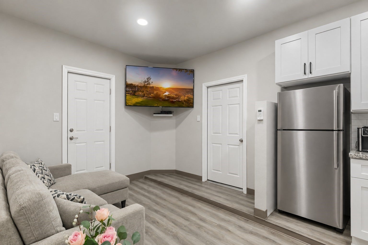 Concept rendering showing a possible private-entry configuration for the converted garage living area. Rendering depicts potential modifications and is not the current condition.