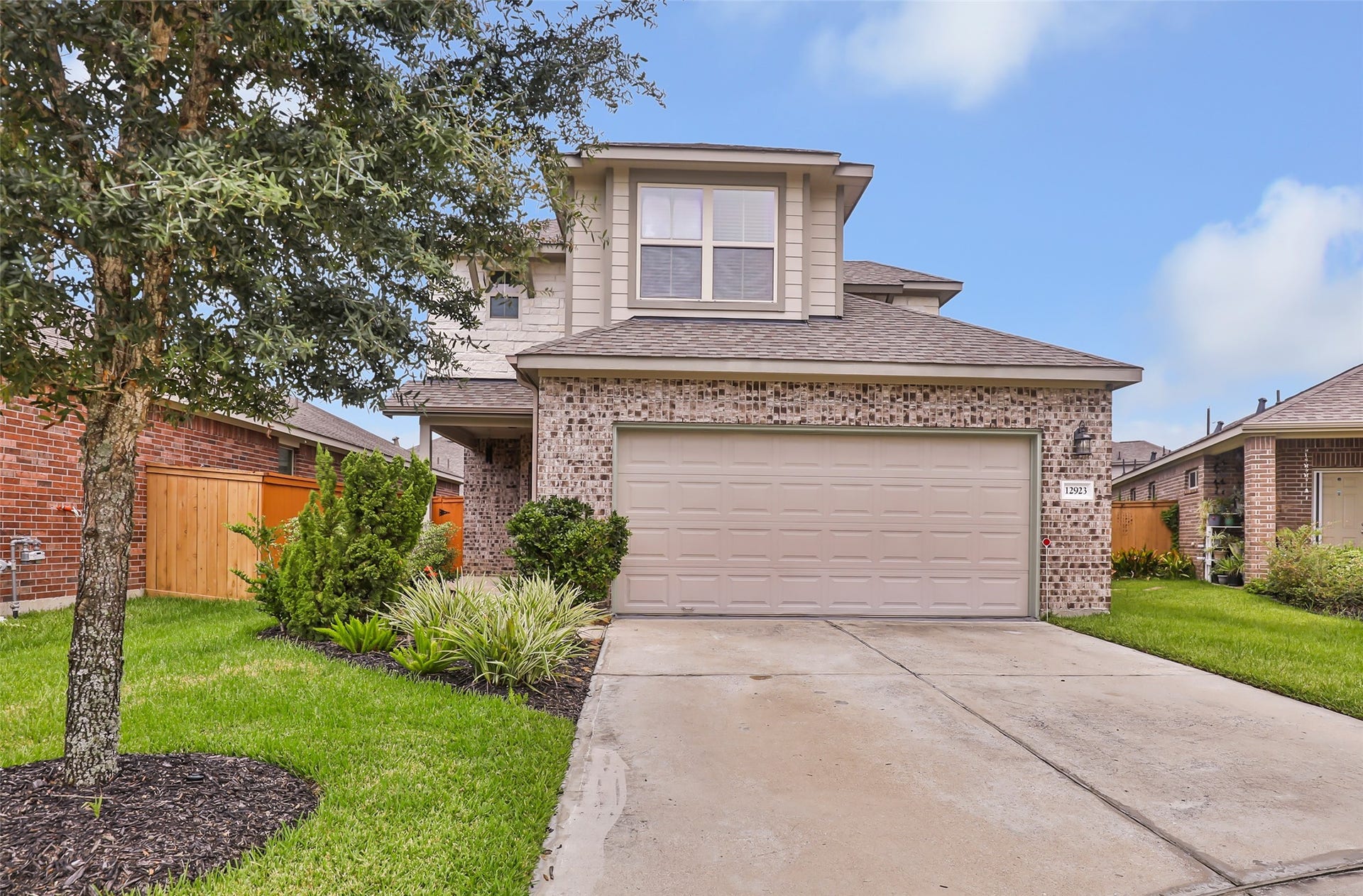 This beautiful Balmoral home features a brick exterior, manicured landscaping and welcoming curb appeal.