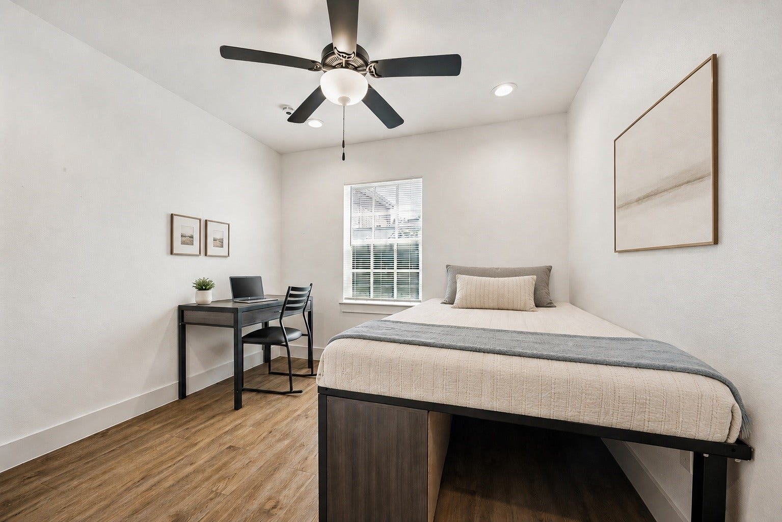 One of the Five spacious bedrooms in the First front unit with an integrated work space
