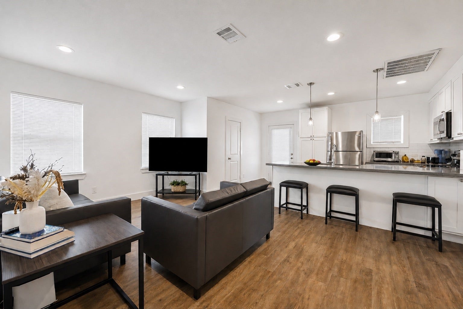 Alternate view of the Second floor Front unit living space showcasing the living kitchen combination layout.