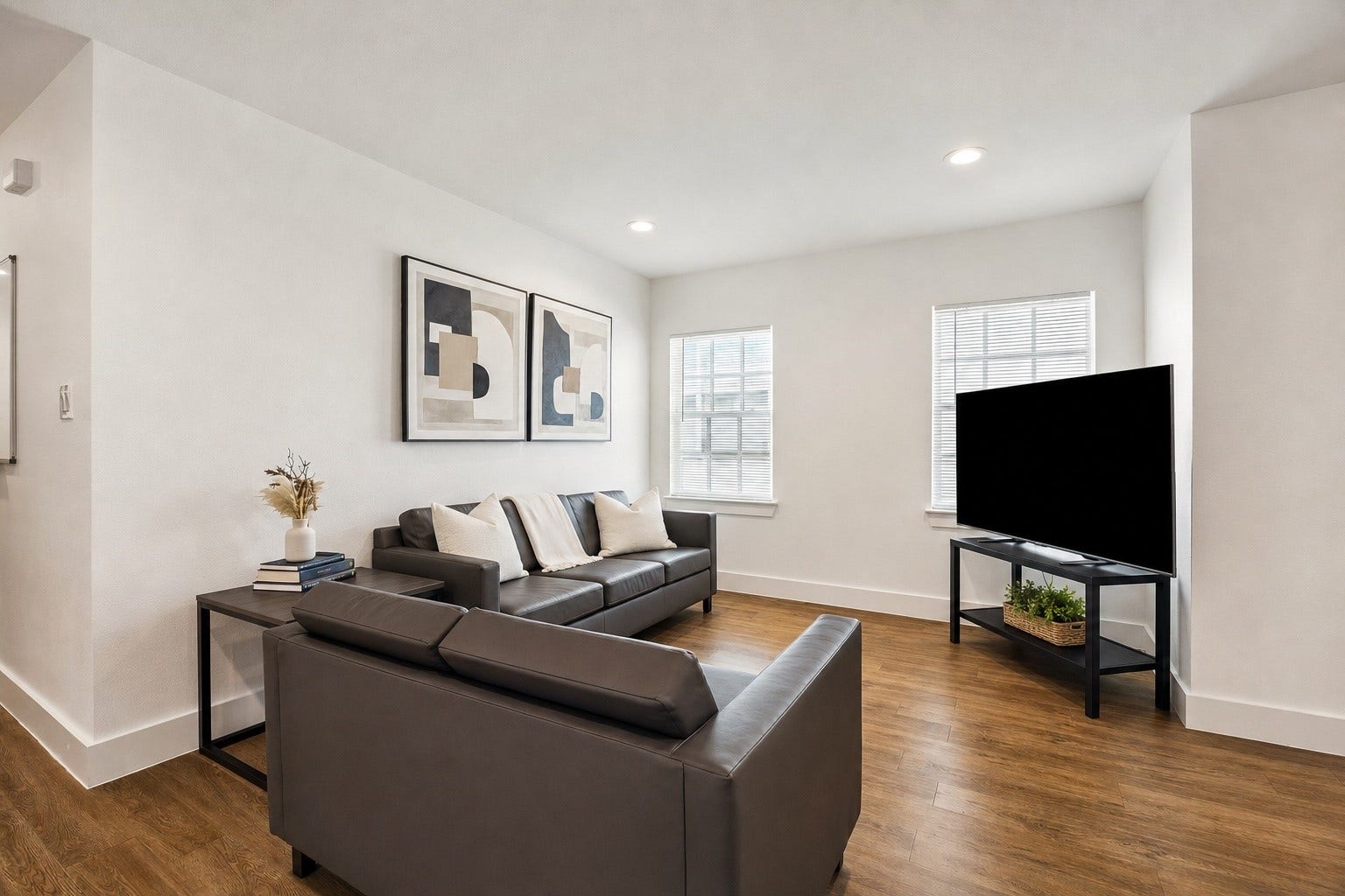 Second floor Front unit spacious living space with an interior illuminated nicely with natural light.
