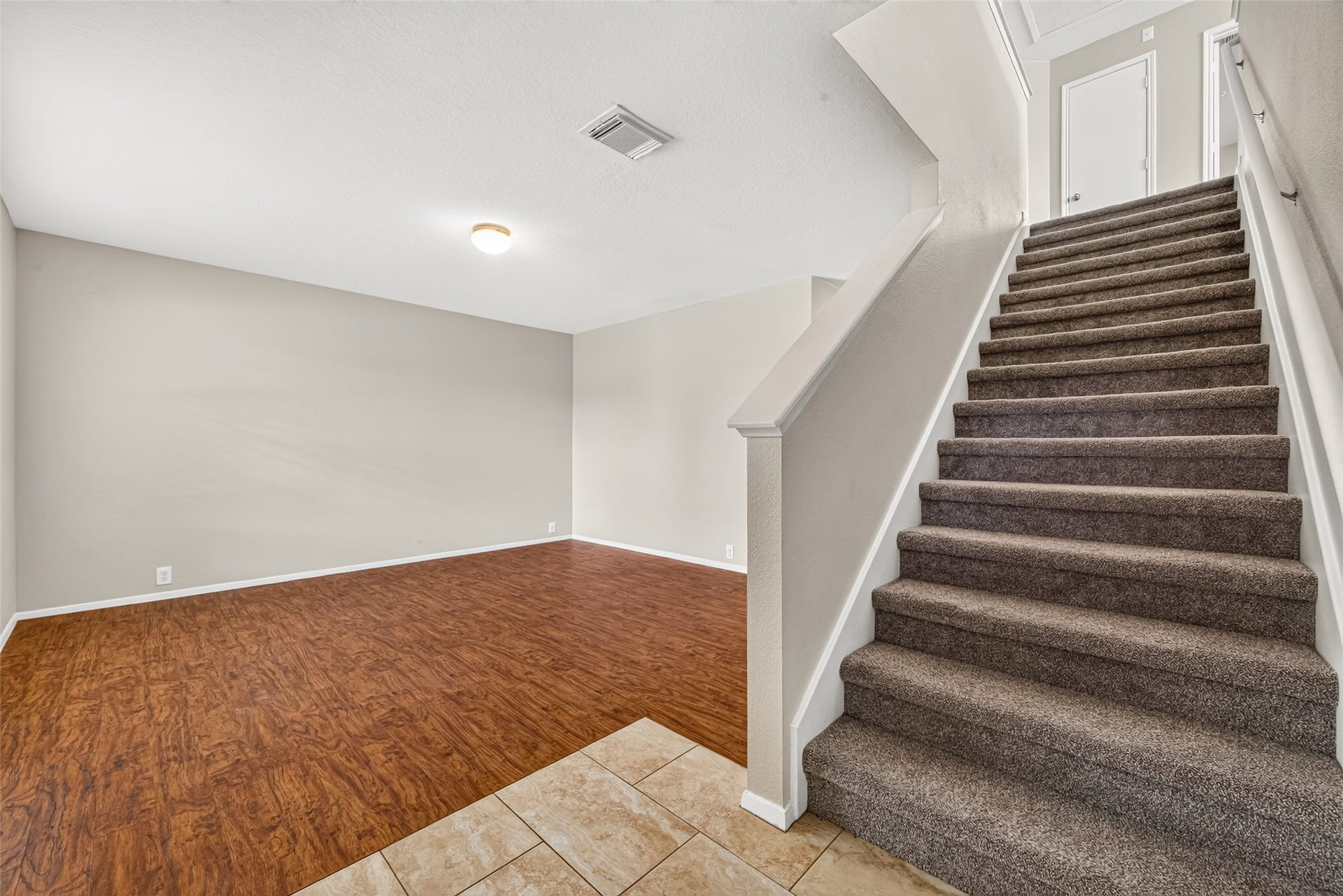 3203 Becker Glen Street, Fresno, TX 77545 Entrance view of the home showcasing the staircase and the spacious formal living room