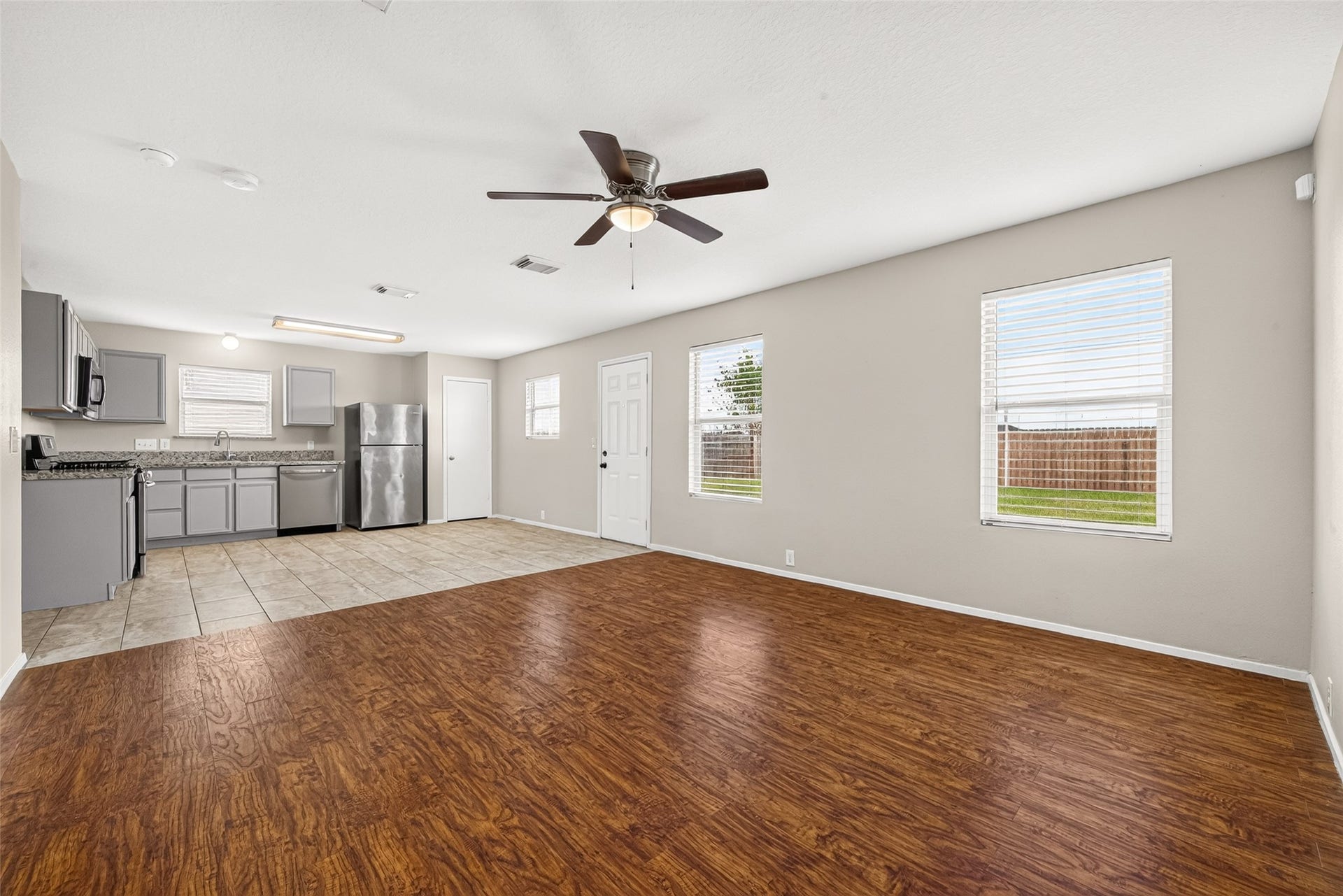 3203 Becker Glen Street, Fresno, TX 77545 This stunning home features a spacious open-concept living area that flows seamlessly into the kitchen. With two distinct living spaces and an abundance of natural light, the home feels bright, airy, and perfect for both daily living and entertaining