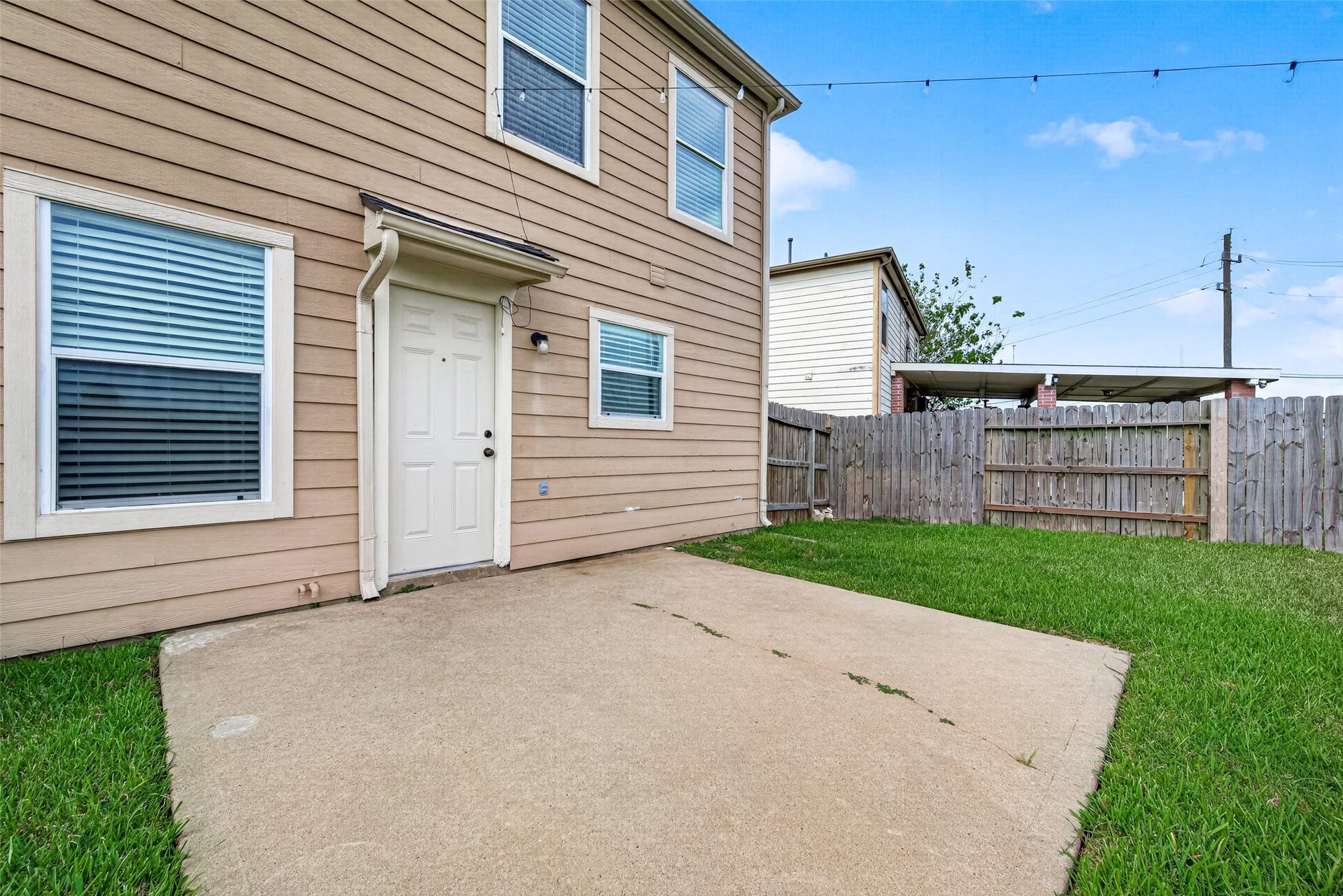 3203 Becker Glen Street, Fresno, TX 77545 This fully fenced backyard features a spacious concrete patio flooring perfect for outdoor furniture and entertaining
