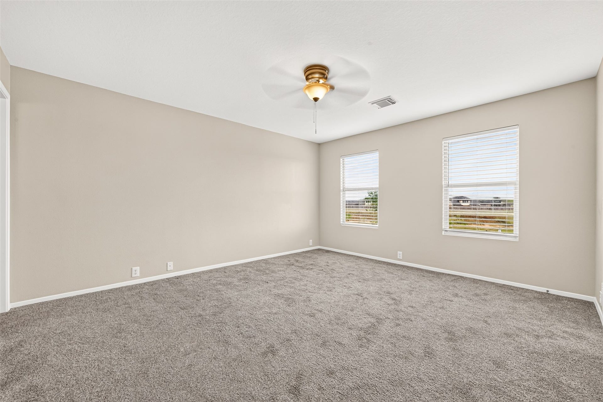 3203 Becker Glen Street, Fresno, TX 77545 Primary bedroom features lots of natural light and ample space