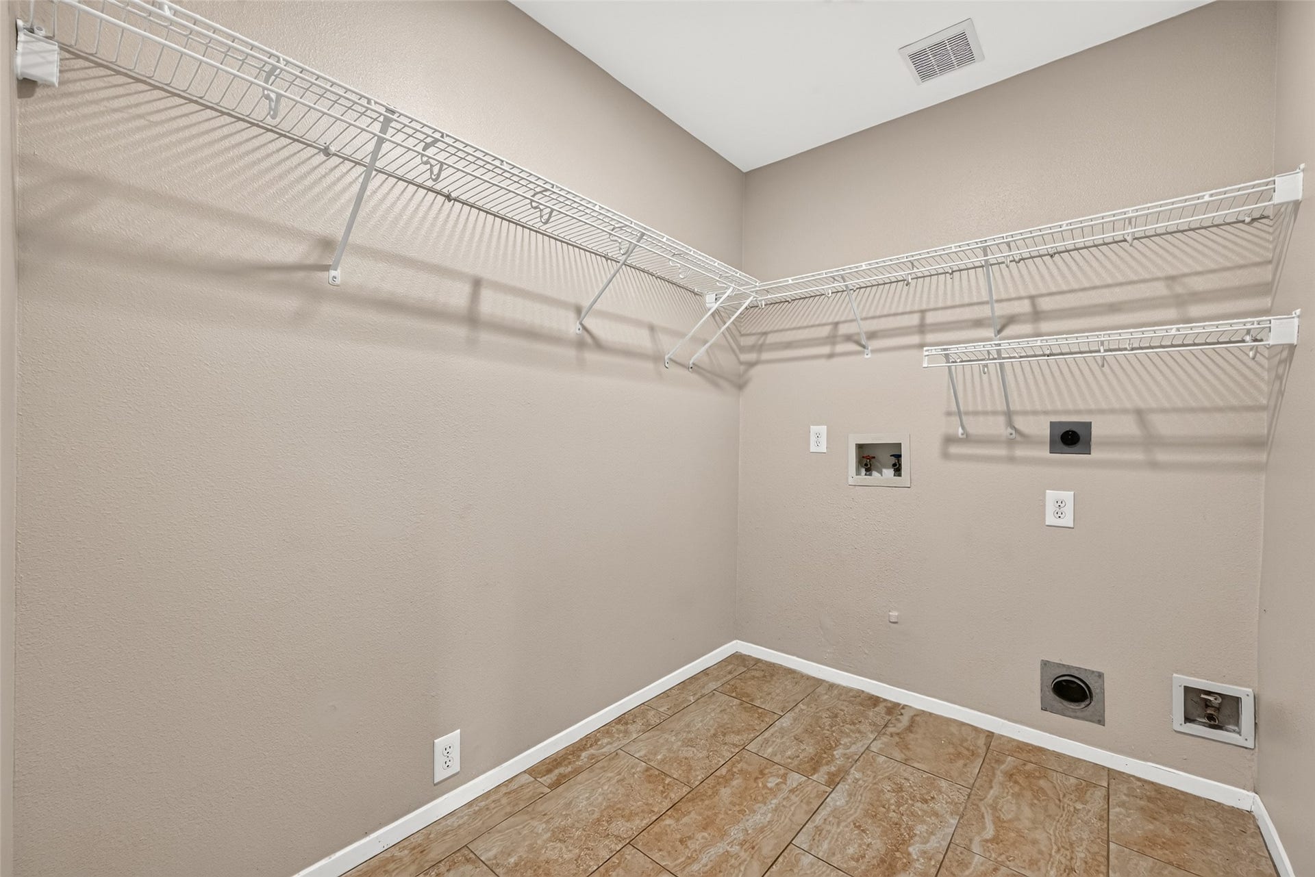 3203 Becker Glen Street, Fresno, TX 77545 Utility room located in house with built-in shelves for extra storage