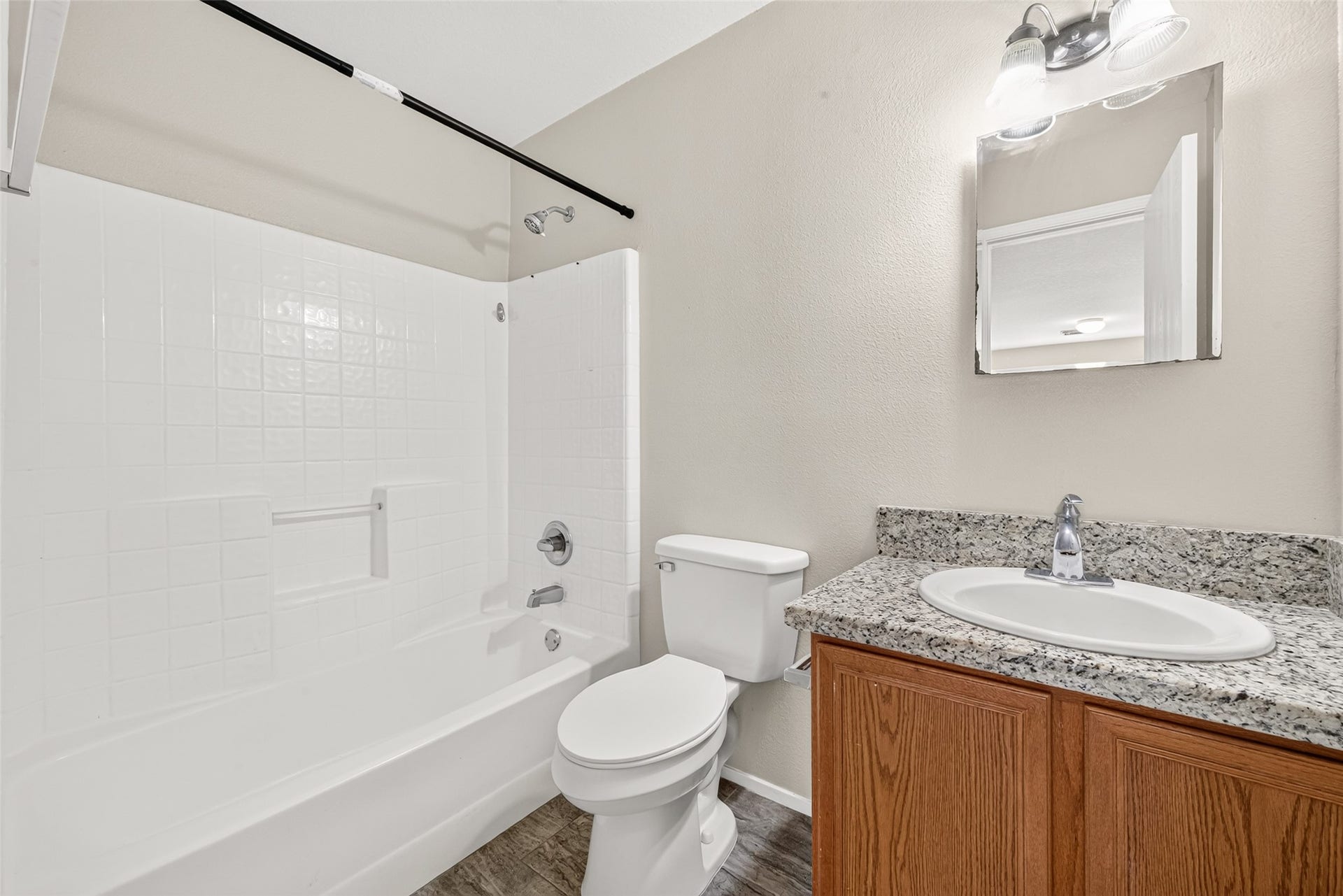 3203 Becker Glen Street, Fresno, TX 77545 Guest bathroom features a tub/shower combo