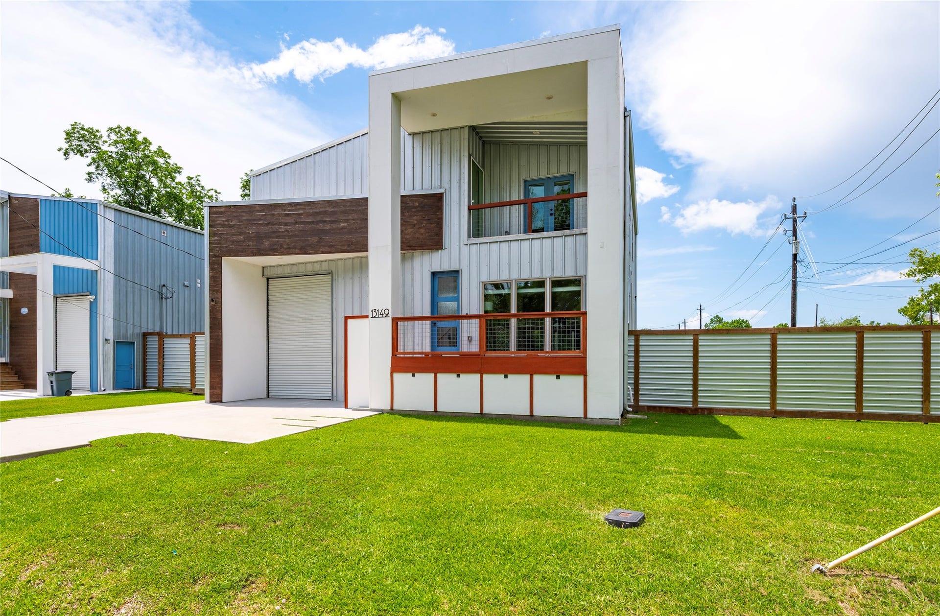 13149 W 6th Street, Santa Fe, TX 77510 Modern style home with quiet country location! Located on an oversized 9,900-sf corner lot, this custom home features upscale finishes and quality construction with full 8' tall private fencing made from cedar, exterior pine, and metal.