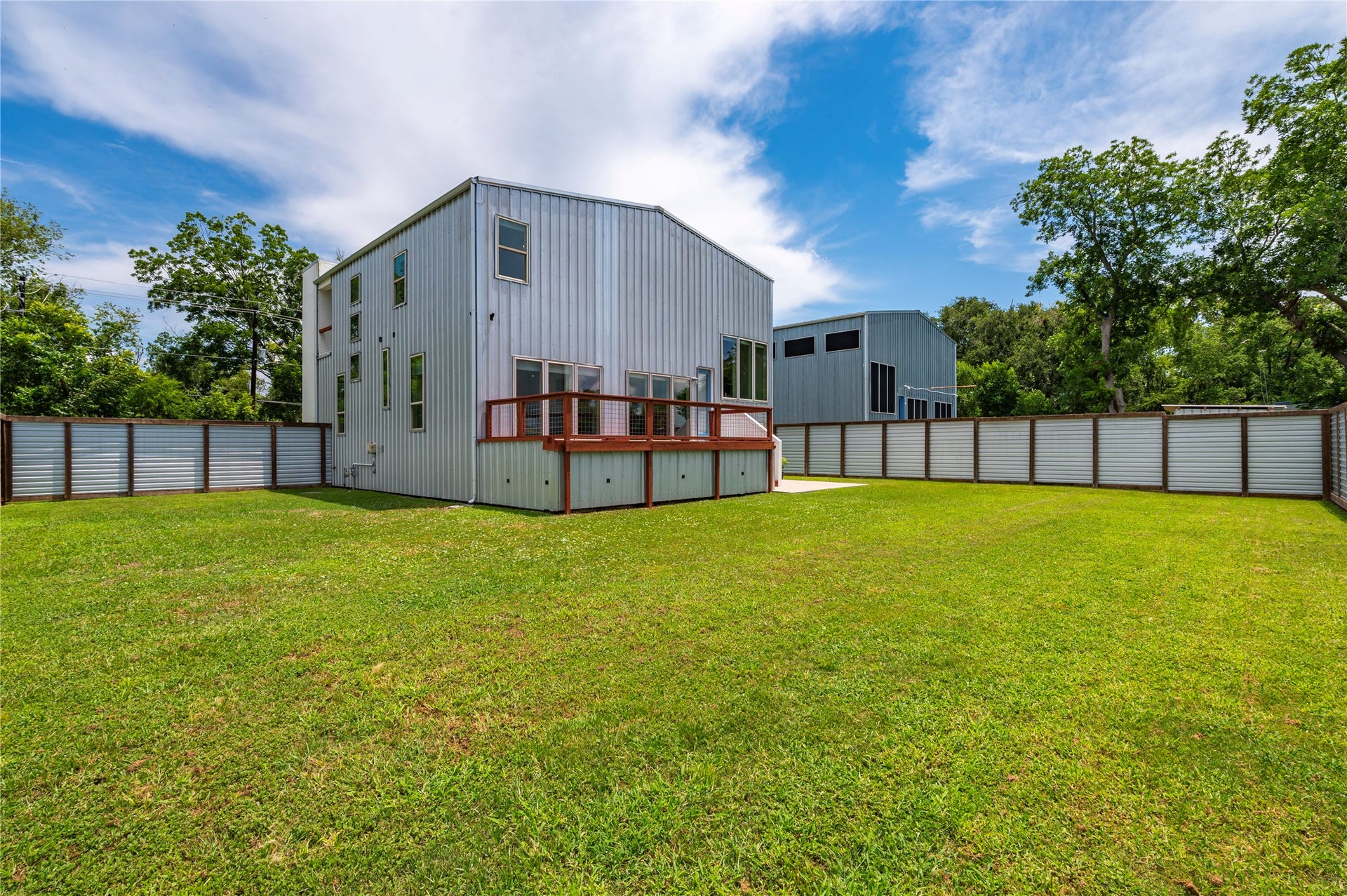 13149 W 6th Street, Santa Fe, TX 77510 Pool size backyard on private corner lot. 8' tall fencing made from cedar, exterior pine, and metal.