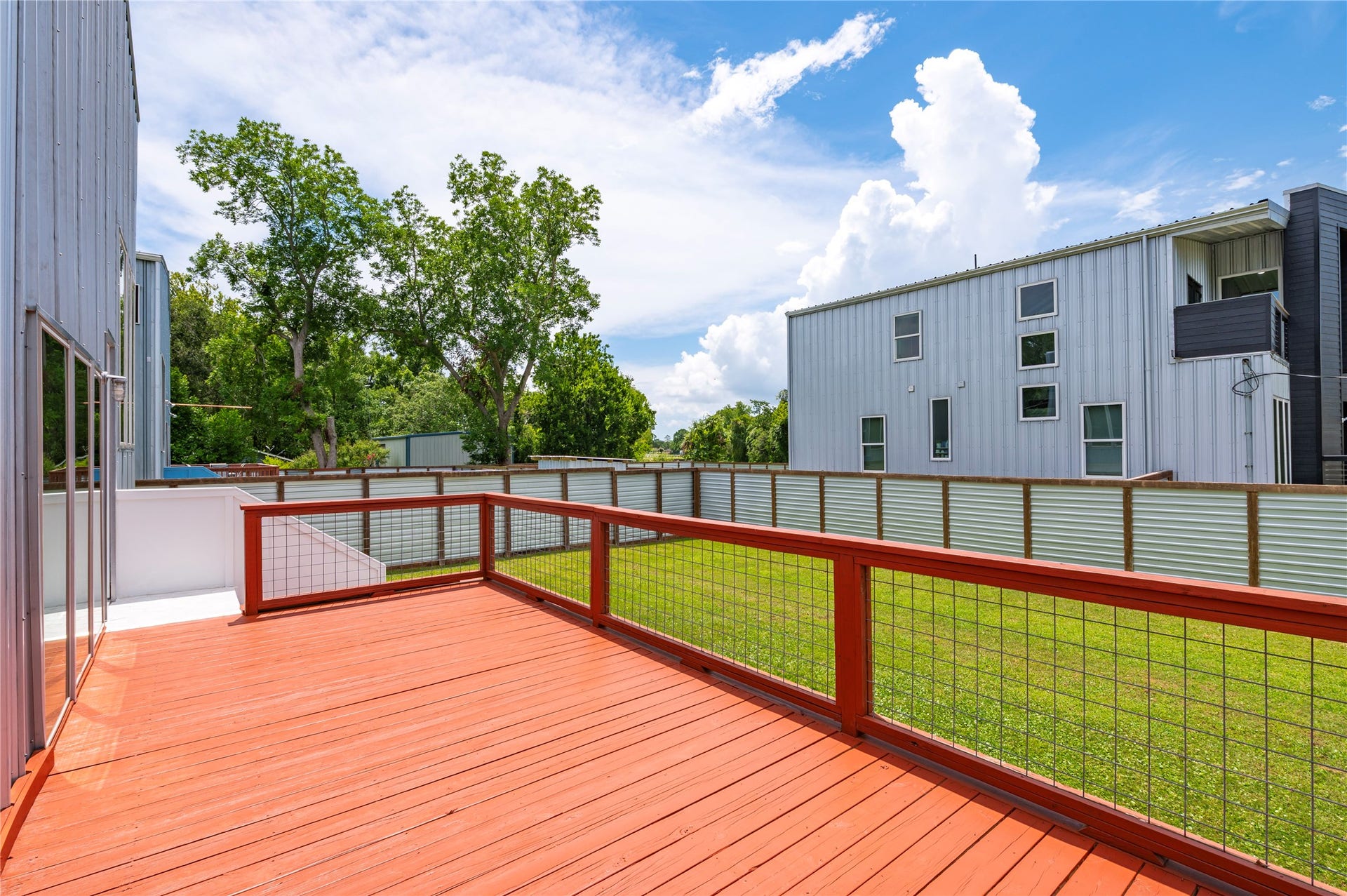 13149 W 6th Street, Santa Fe, TX 77510 Ample entertainment space; large deck over looking backyard.