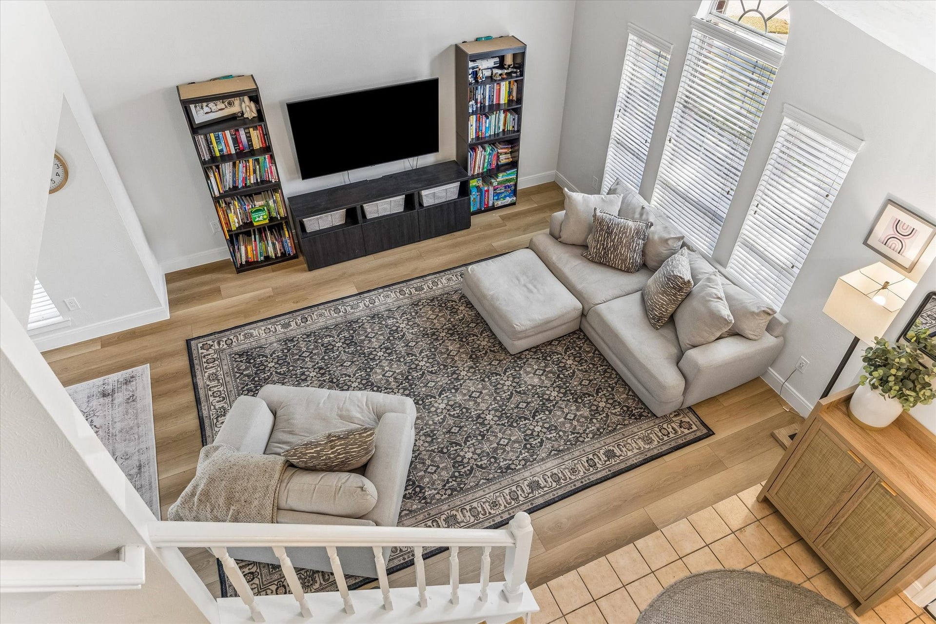 1043 Danforth Drive, Houston, TX 77062 Bright and inviting living room with high ceilings, perfect for relaxation and entertainment.