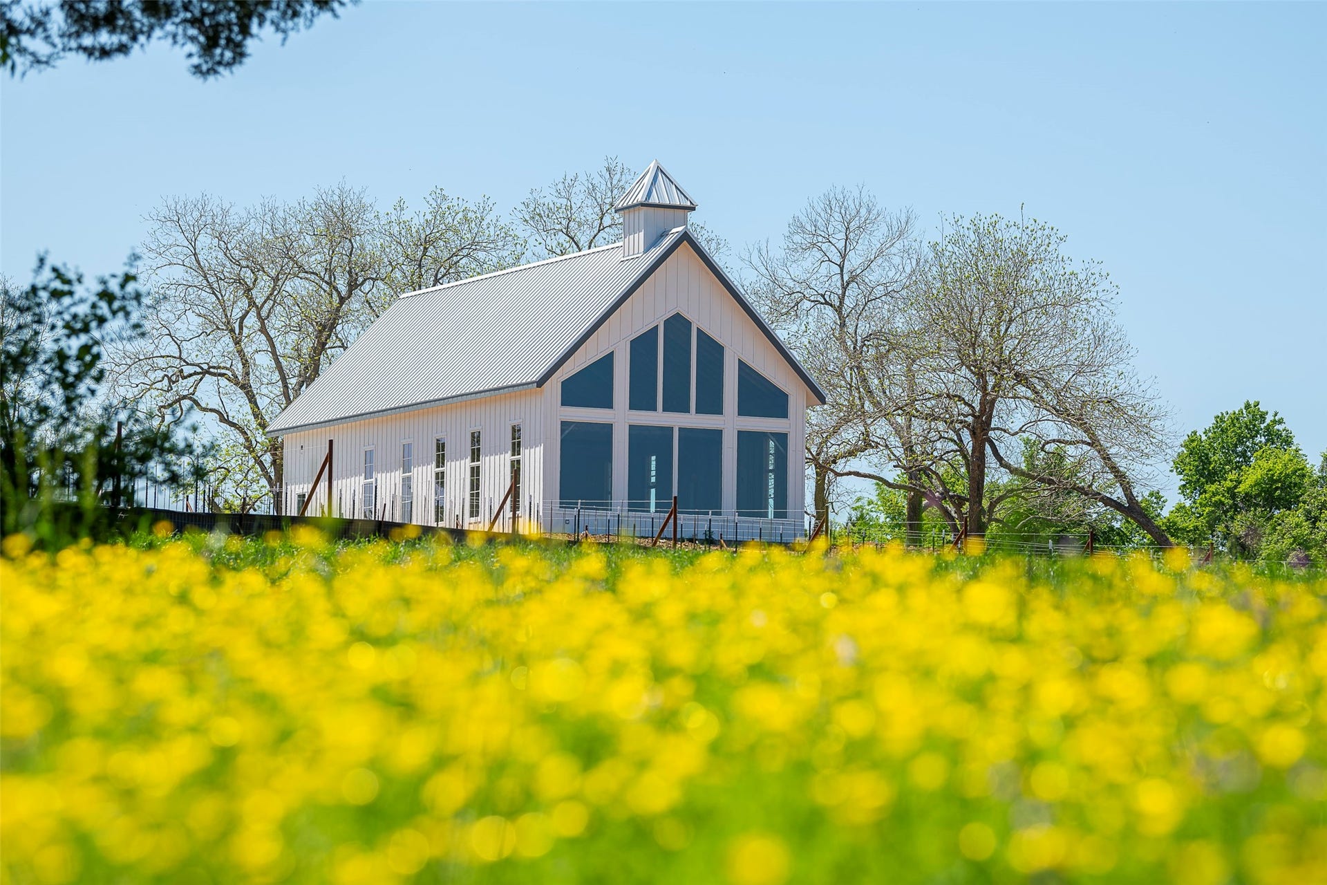 Surrounded by natural beauty, the Chapel at Chambers Creek offers a tranquil space for worship, reflection, and meaningful gatheringsbringing neighbors together in a peaceful, picturesque setting.