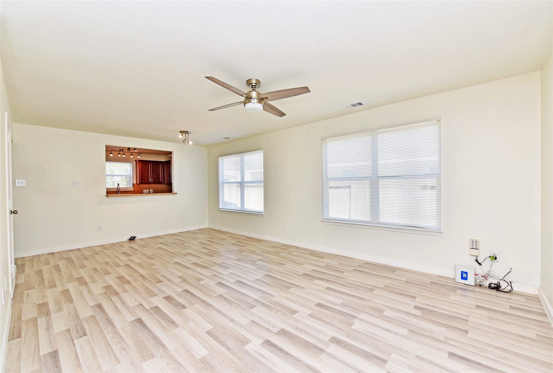 6711 Haven Forest Lane, Rosenberg, TX 77469 This family room has room for a dining table if you need extra dining space.