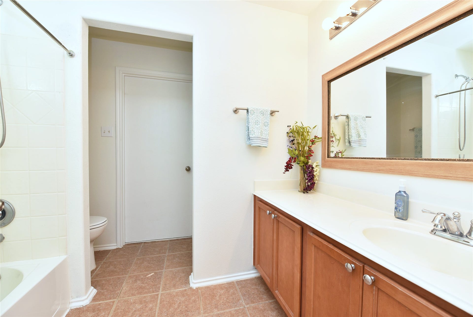 6711 Haven Forest Lane, Rosenberg, TX 77469 The primary bathroom has a tub/shower combination, and a large walk-in closet.