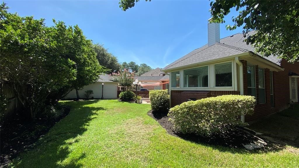 5510 Cherry Creek Bend Court, Houston, TX 77041 Enjoy serene seclusion in your own lush, private backyard oasis.