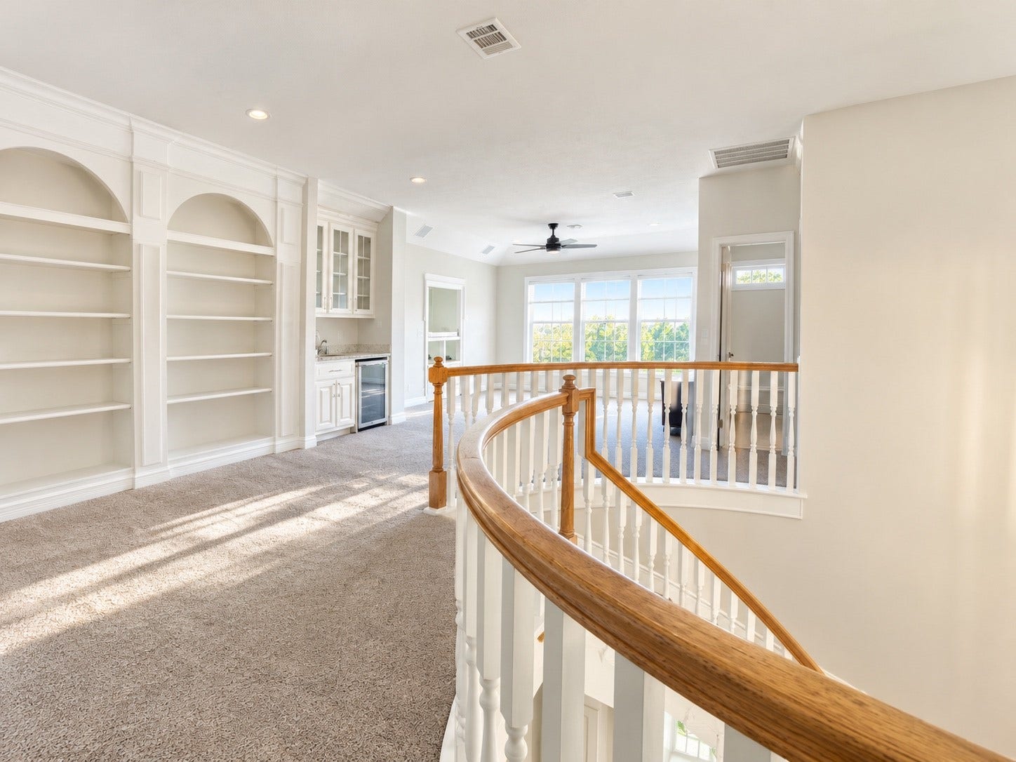 5510 Cherry Creek Bend Court, Houston, TX 77041 Upstairs game room featuring ample shelving for storage and display.