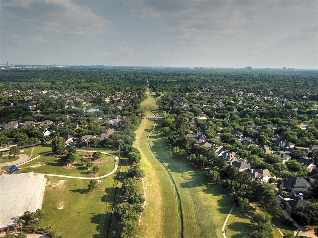 5510 Cherry Creek Bend Court, Houston, TX 77041 Discover scenic trails perfect for walking and exercise right outside your door.