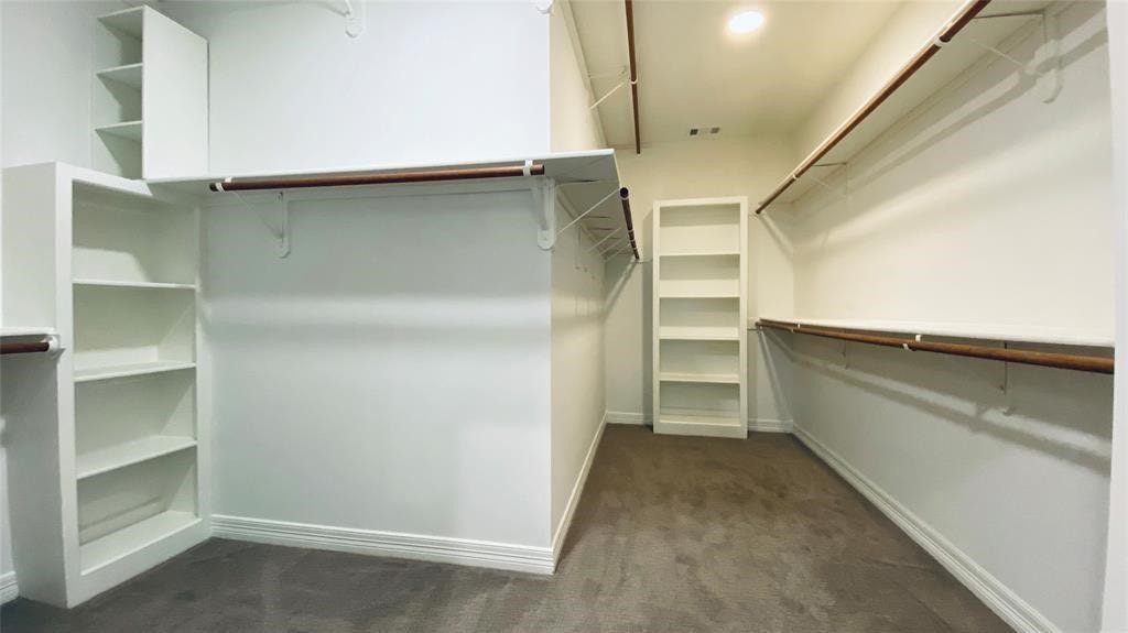 5510 Cherry Creek Bend Court, Houston, TX 77041 Expansive walk-in closet in the primary bedroom offers ample storage and organization.