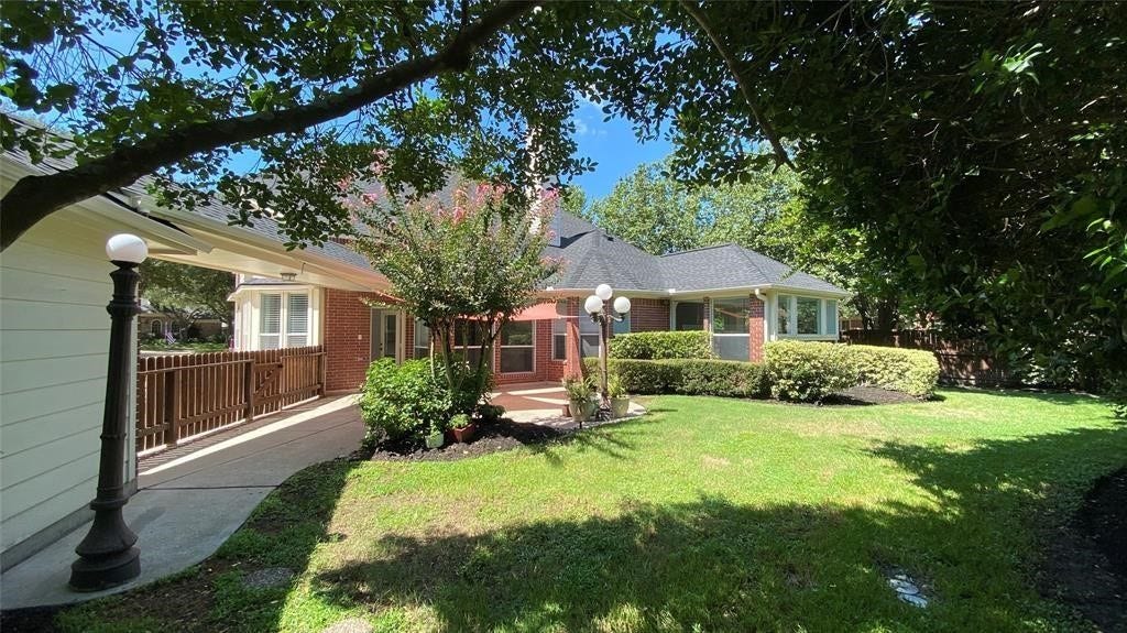 5510 Cherry Creek Bend Court, Houston, TX 77041 Enjoy the tranquility of your private, shaded oasisperfect for relaxation and outdoor gatherings.