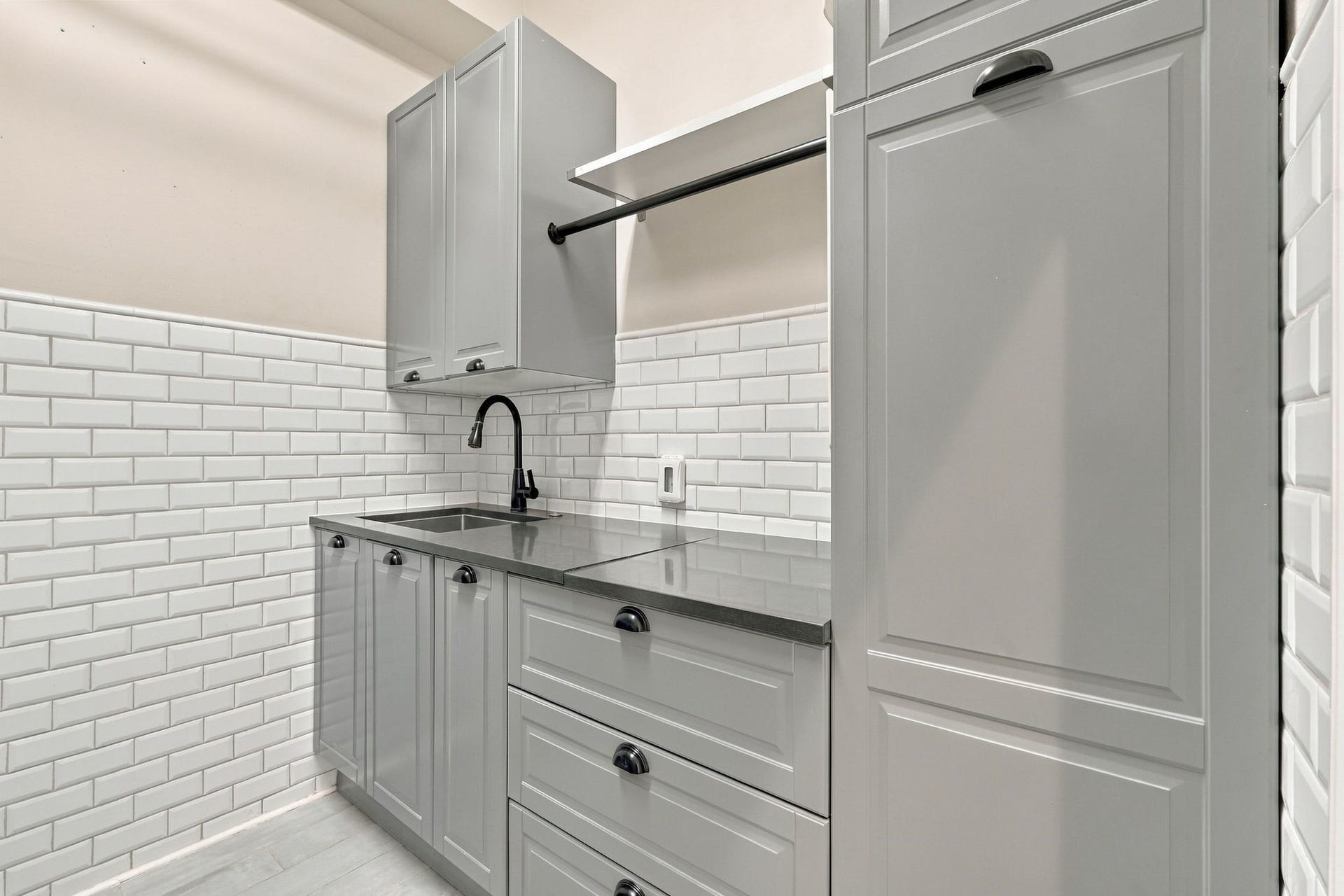 22 Hillside View Place, The Woodlands, TX 77381 The laundry room offers plenty of storage and space to fold and organize your clothing. Washer and dryer convey with the home.