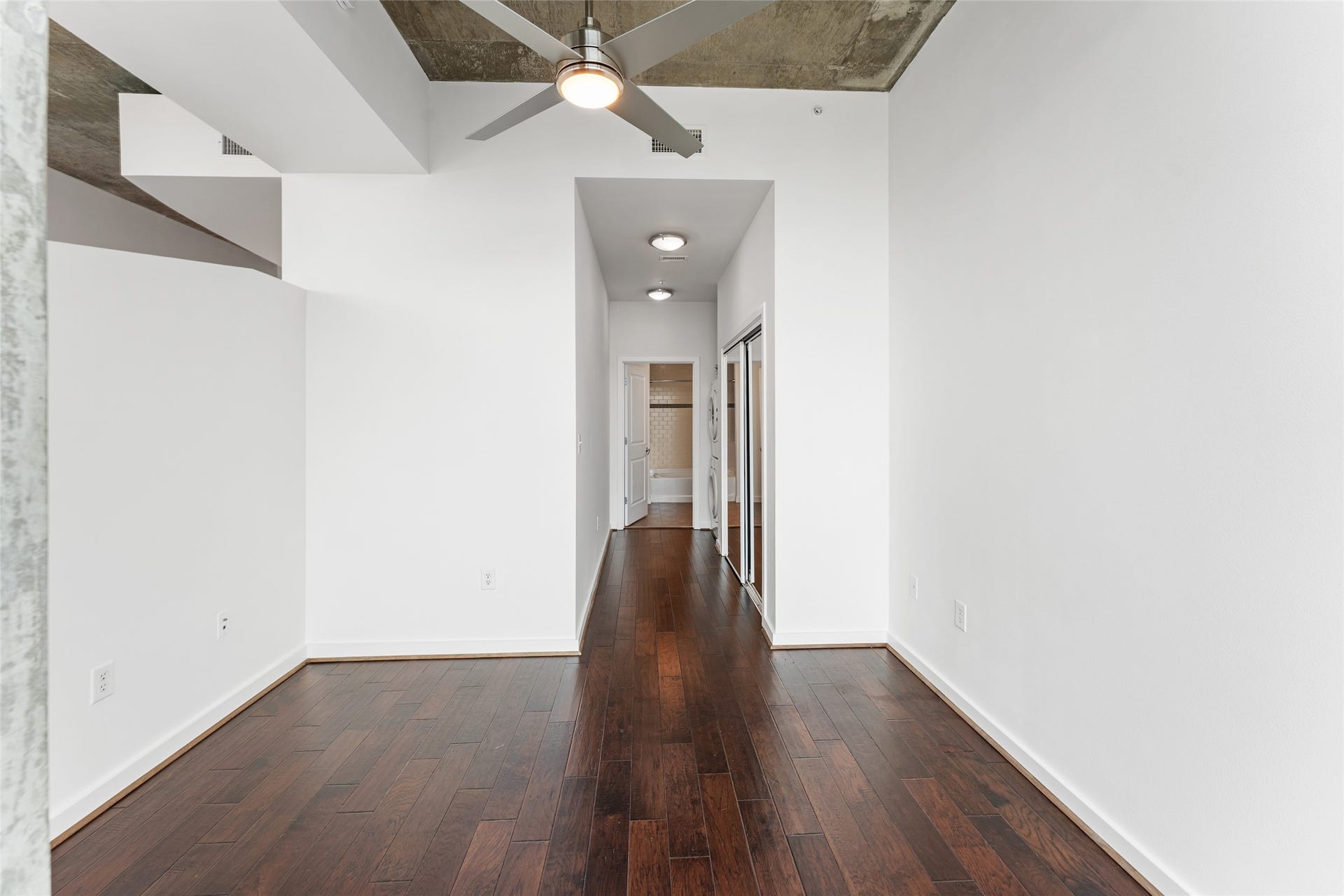 5925 Almeda Road, #12711, Houston, TX 77004 The bedroom includes a walkway to laundry area and ensuite bathroom.