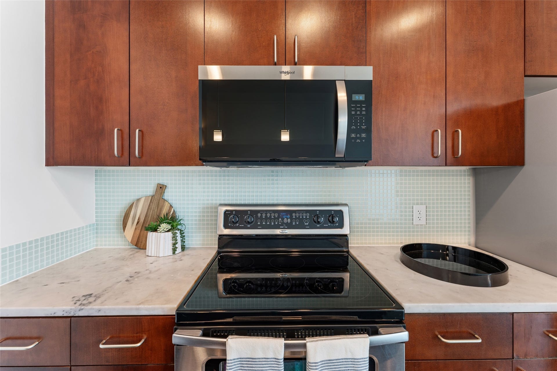 5925 Almeda Road, #12711, Houston, TX 77004 This fully equipped kitchen includes a brand new fridge, dishwasher, and microwave.