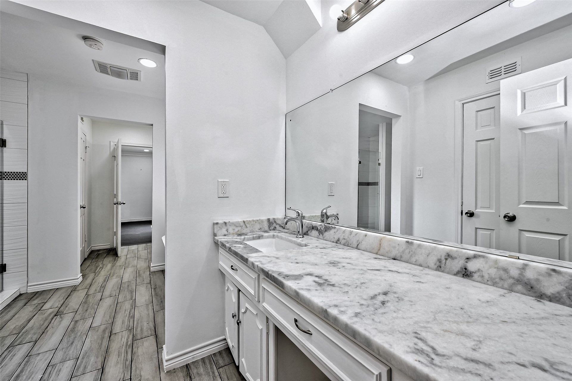One vanity area of the Hollywood bath between 3rd and 4th  bedrooms.