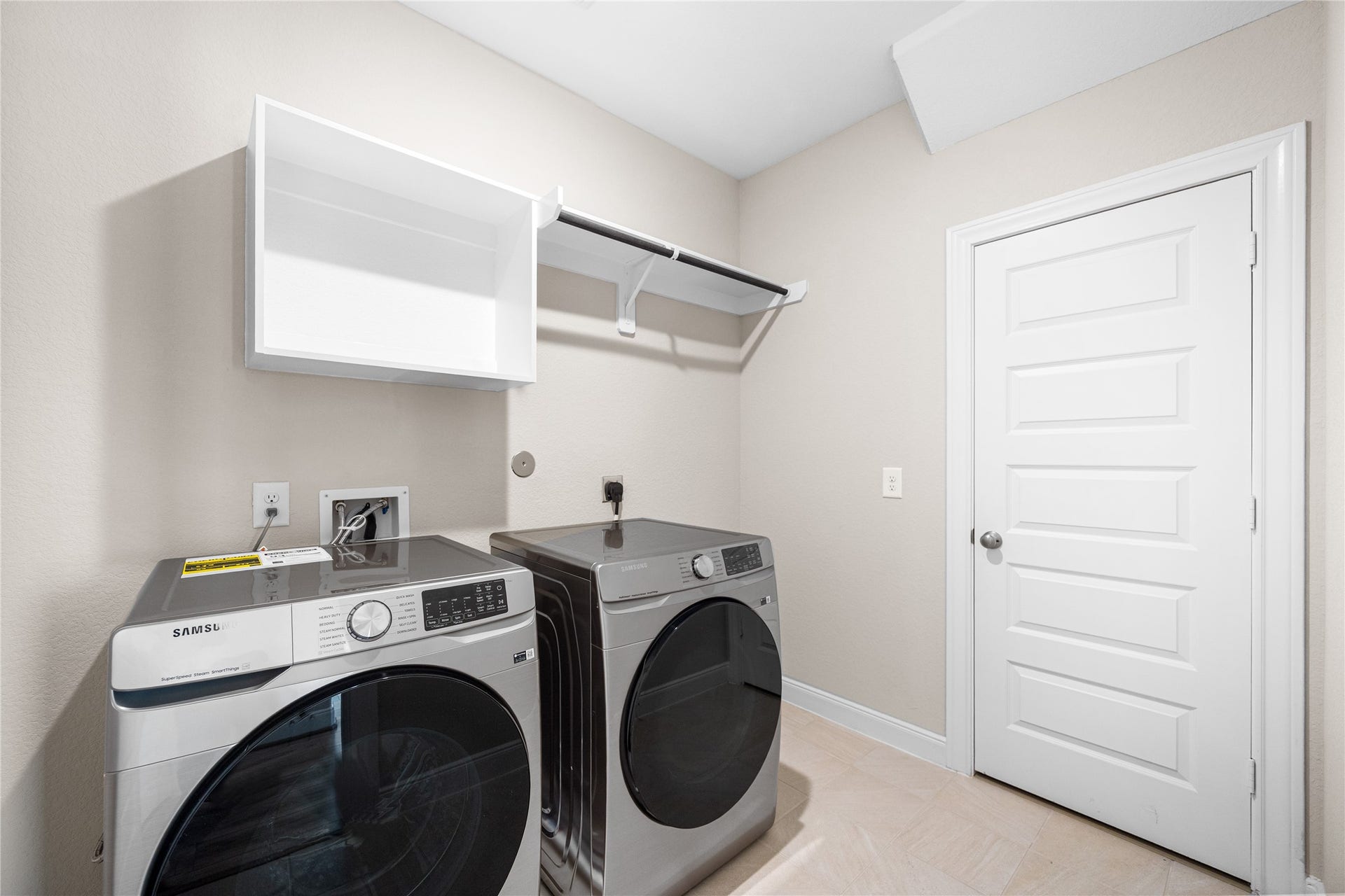 17681 Rosette Grass Drive, Conroe, TX 77385 Spacious laundry room downstairs.