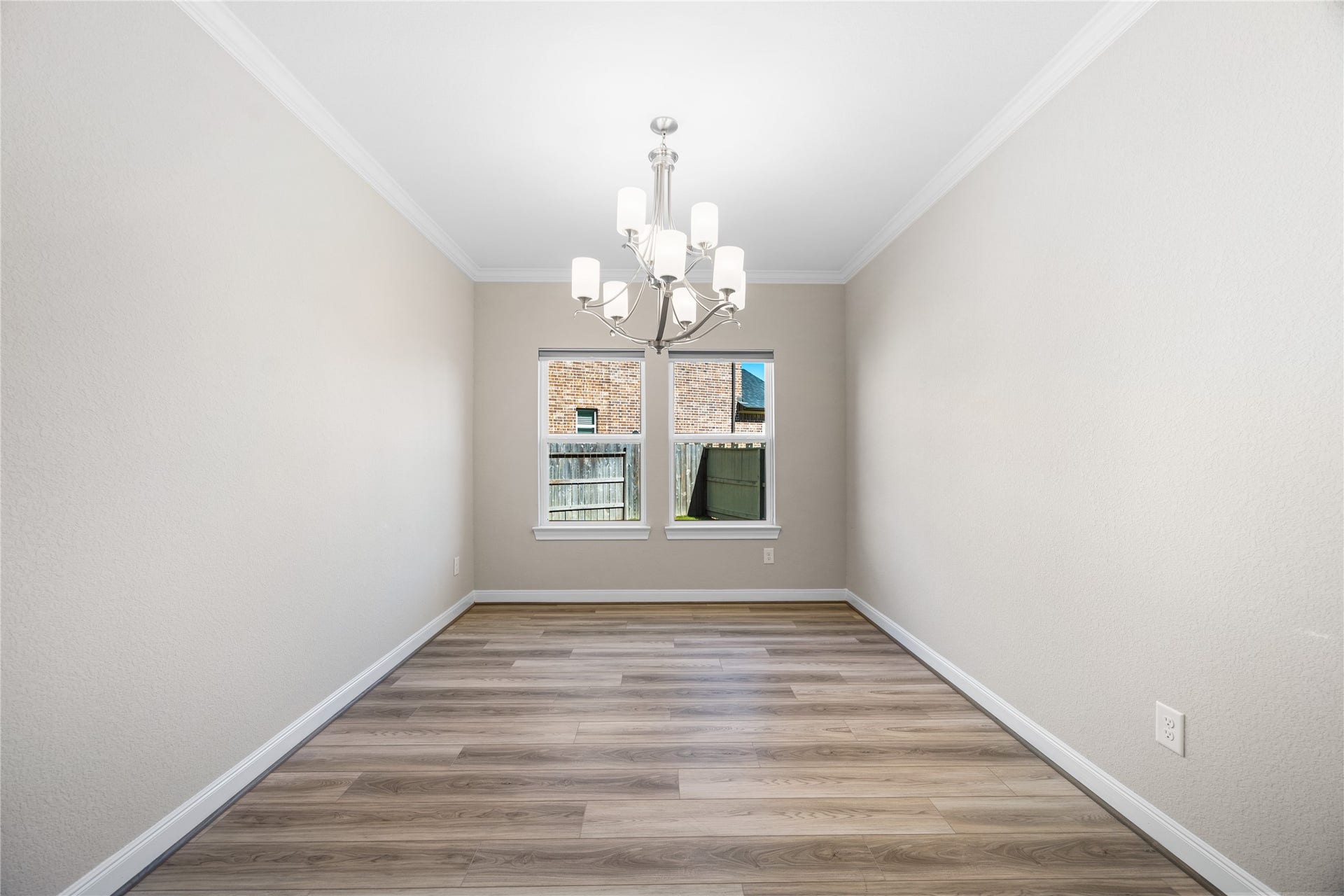 17681 Rosette Grass Drive, Conroe, TX 77385 The dining room is conveniently located just off of the living room.