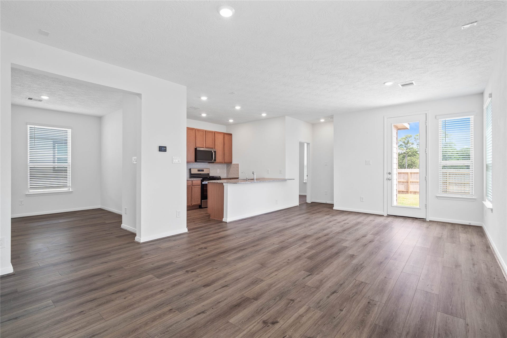 640 Appaloosa Meadow Drive, Magnolia, TX 77354 As you enter, you are greeted by the open concept living space living - the Great Room!
