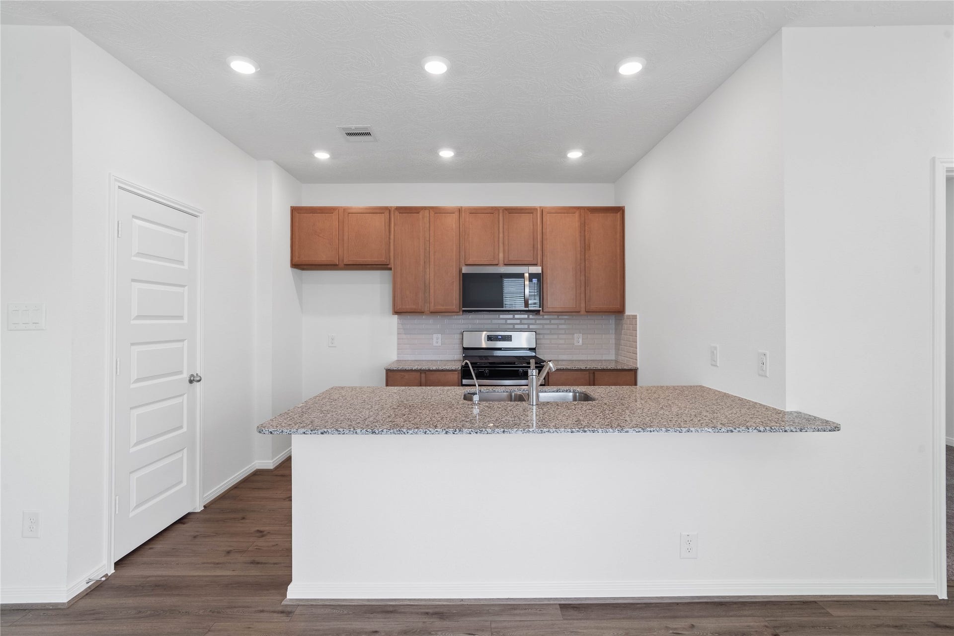 640 Appaloosa Meadow Drive, Magnolia, TX 77354 This spacious kitchen has it allample storage, generous counter space, and a layout that truly makes it the heart of the home.