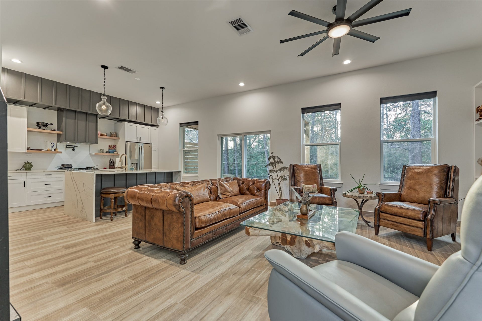 Enjoy effortless interaction with family and guests in the living room, which flows directly into the kitchen.
