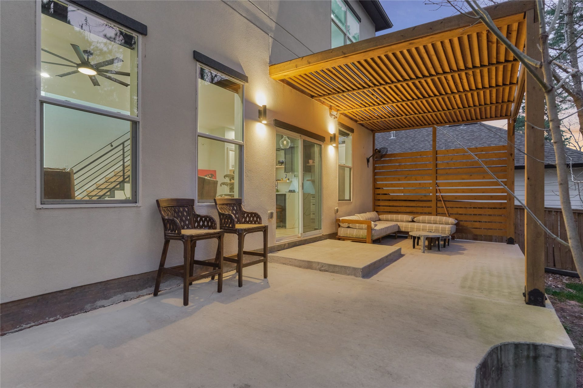 The spacious patio is perfect for entertaining guests or enjoying relaxed outdoor gatherings.
