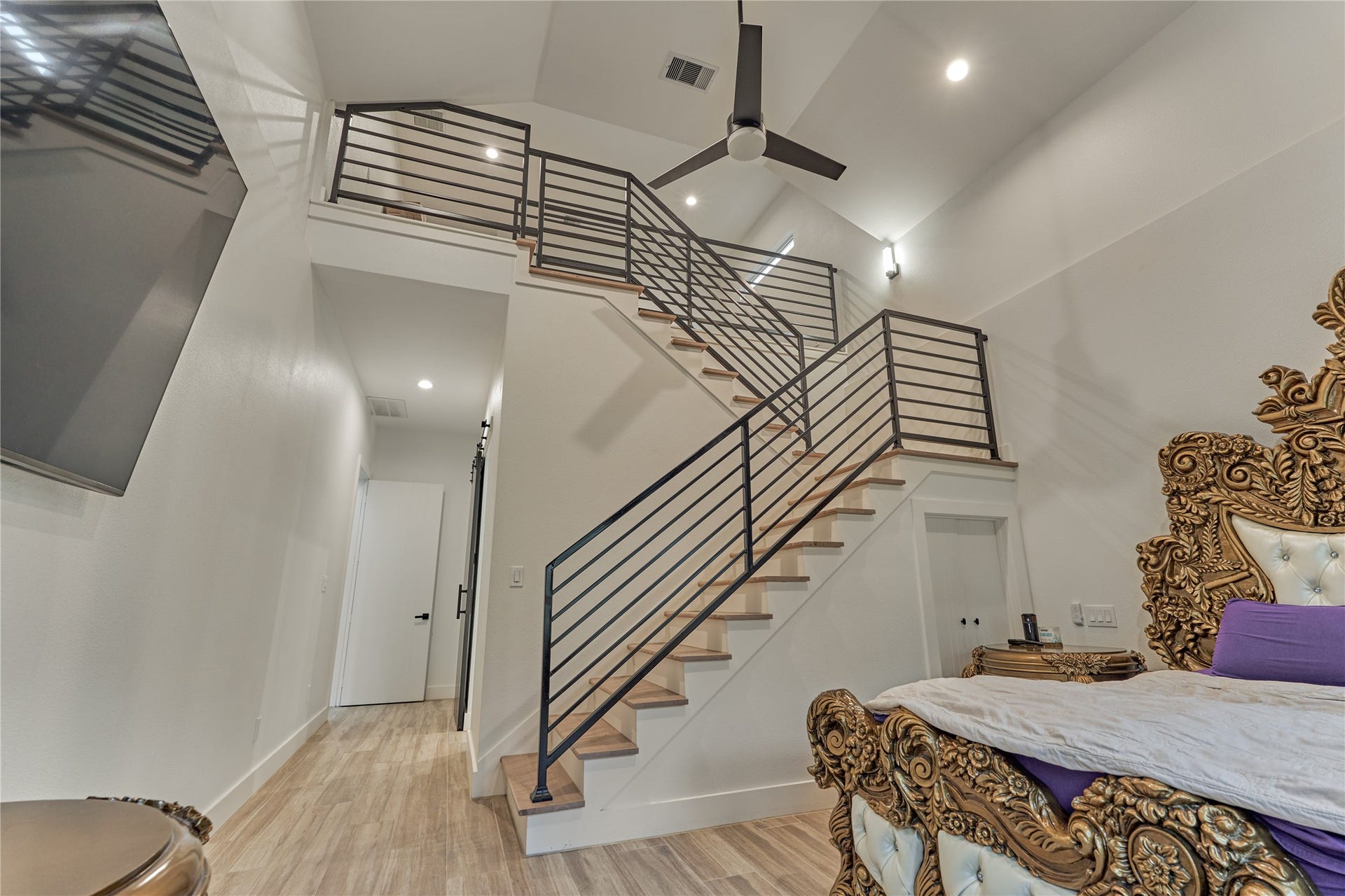 This staircase leads to the loft area in the primary suite!