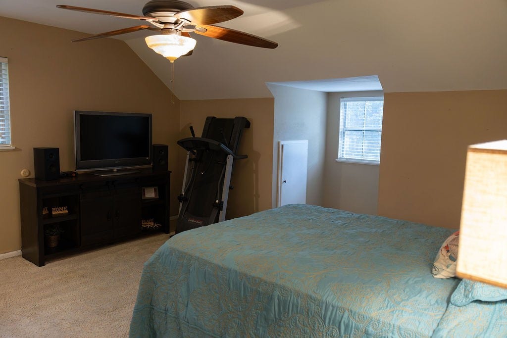 1314 Laurel Street, La Marque, TX 77568 This spacious secondary bedroom is anything but small! It offers plenty of room for larger furniture, creating a comfortable retreat, or can easily accommodate a shared bedroom without feeling cramped.
