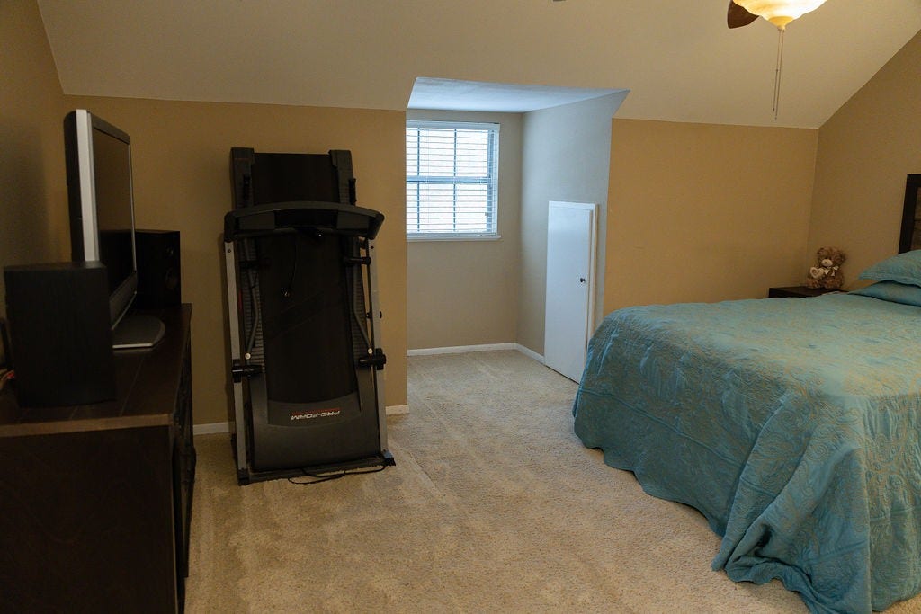 1314 Laurel Street, La Marque, TX 77568 This spacious secondary bedroom is anything but small! It offers plenty of room for larger furniture, creating a comfortable retreat, or can easily accommodate a shared bedroom without feeling cramped.