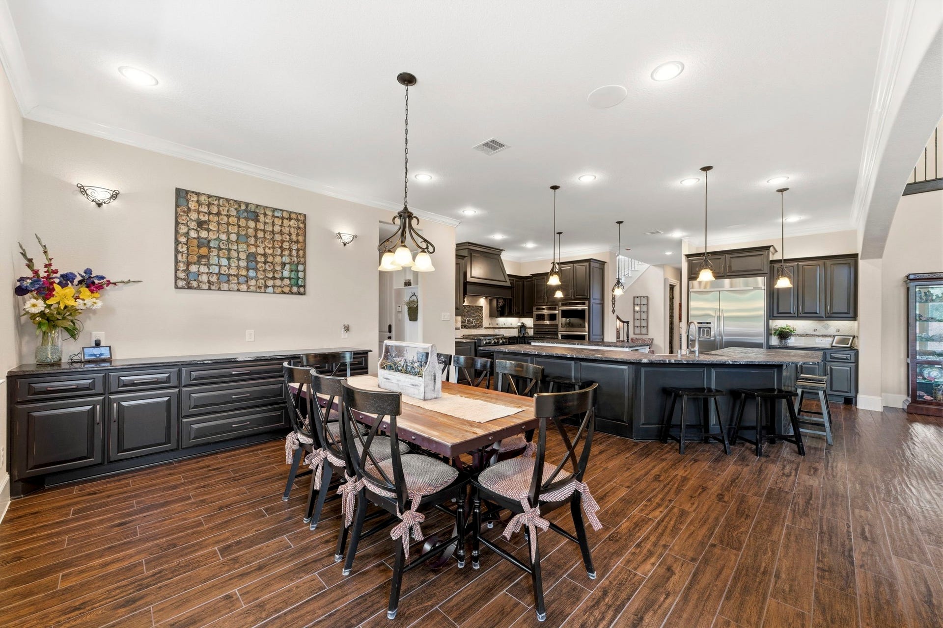 This floorplan was customized and extended to offer ample room in this Kitchen and Dining area.